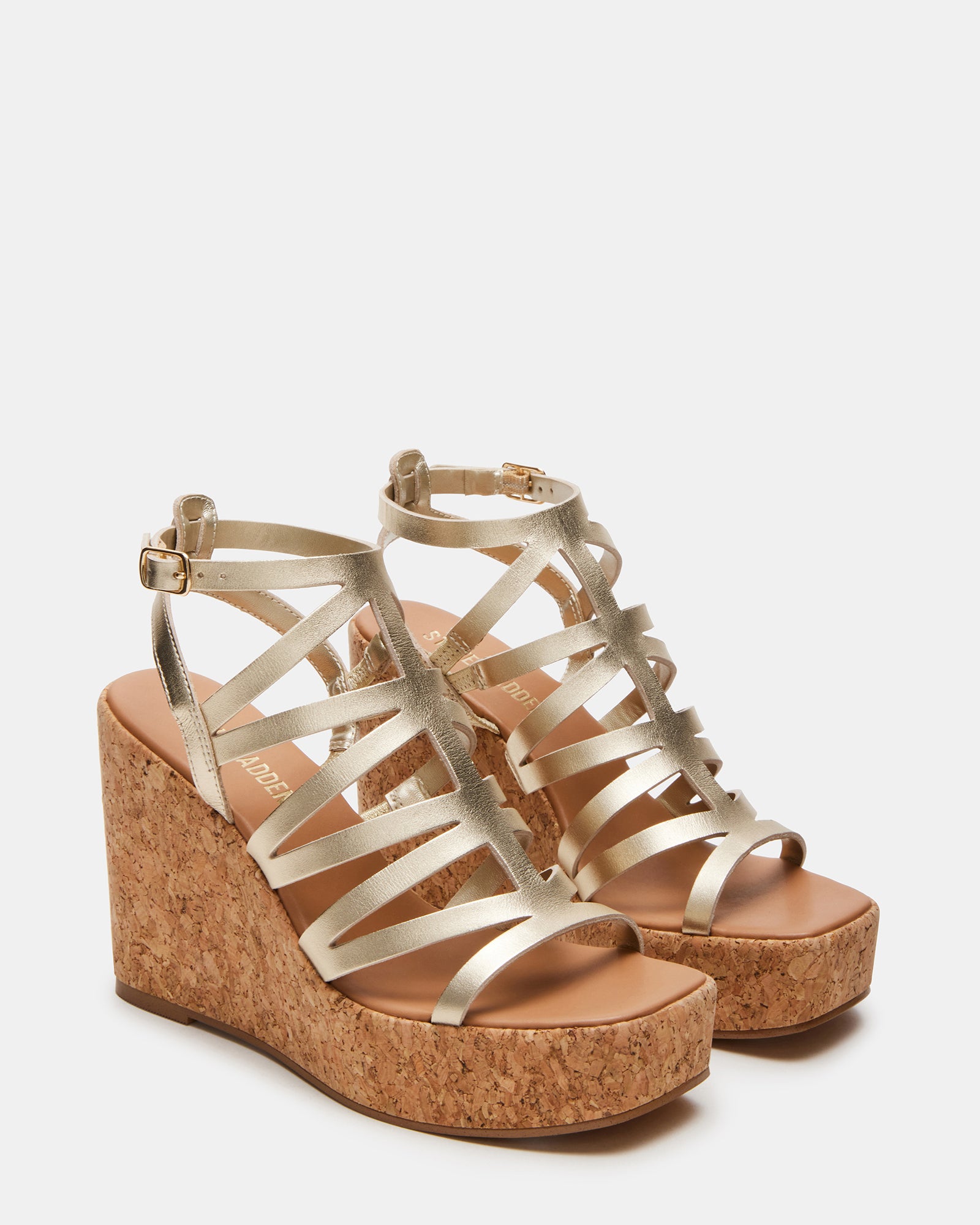Close-up of black strappy sandals showcasing the square toe design.