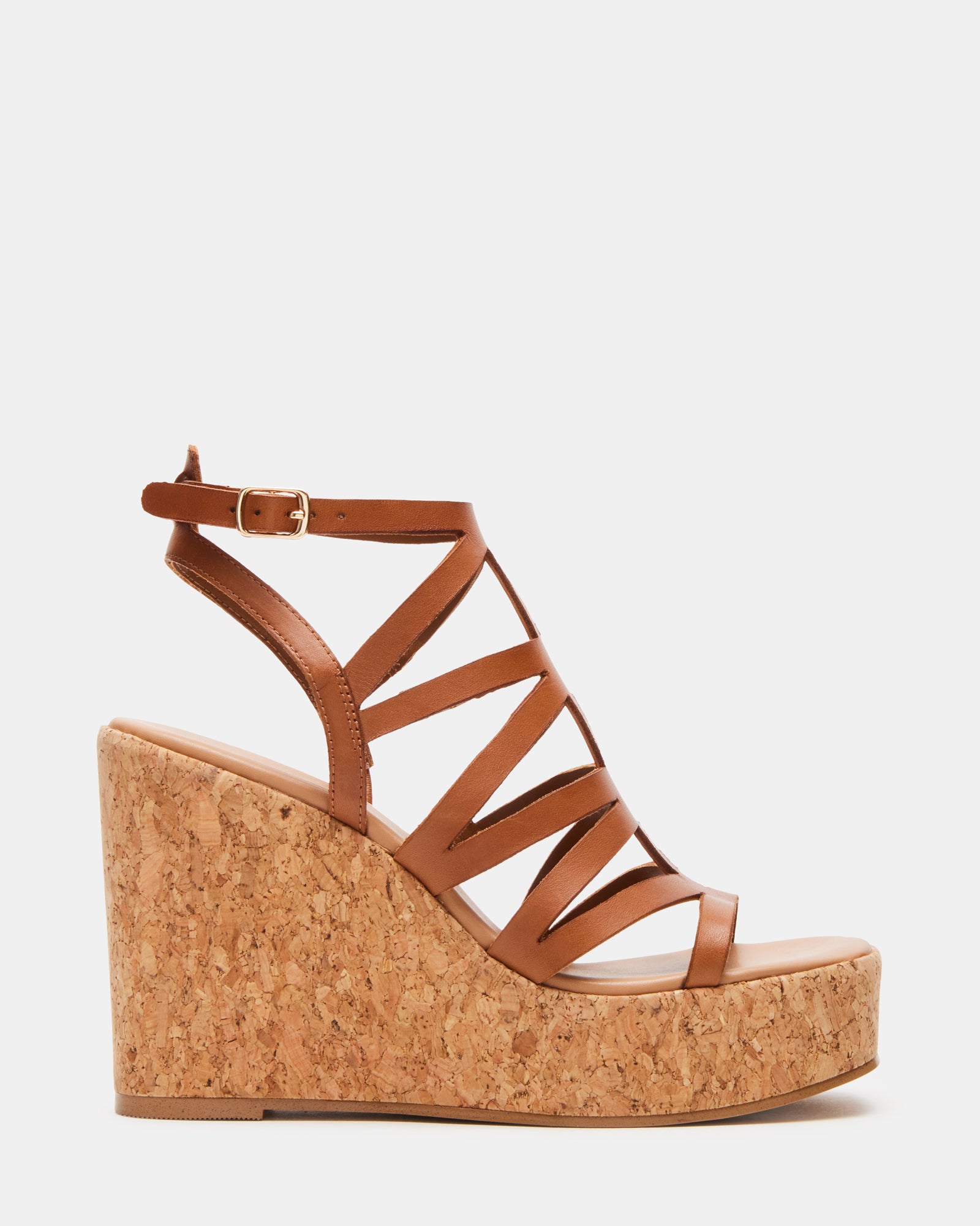 Close-up of Cozette tan leather platform wedge sandals showing square toe design.