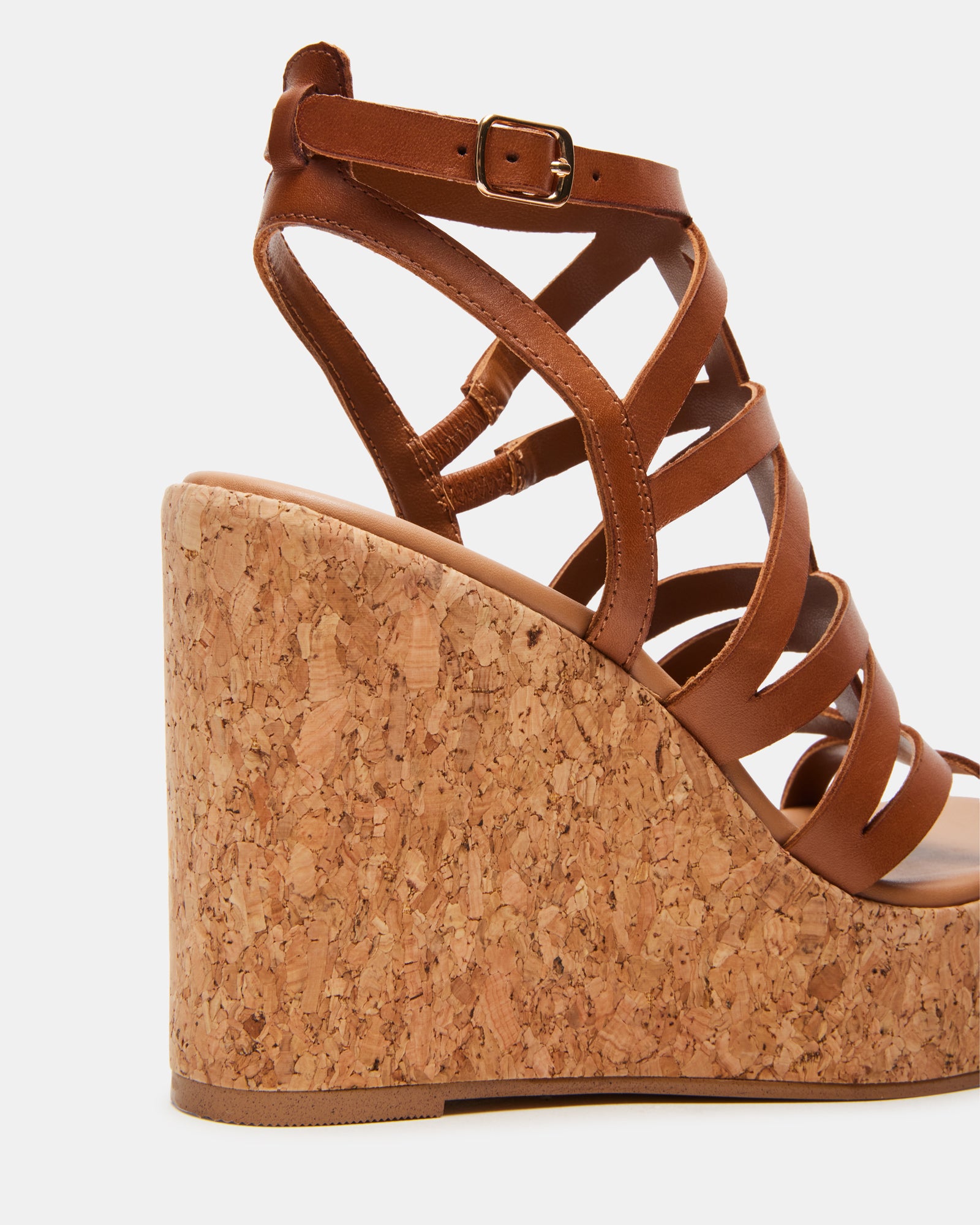 Side view of Cozette wedge sandals highlighting the comfortable heel.