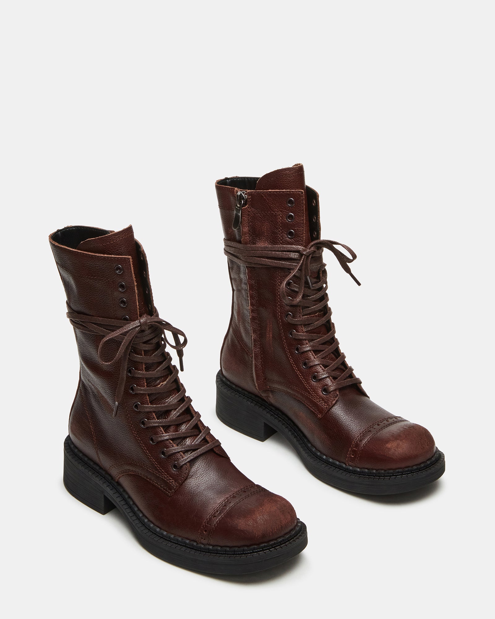 Close-up of leather ankle boots detailing texture and craftsmanship