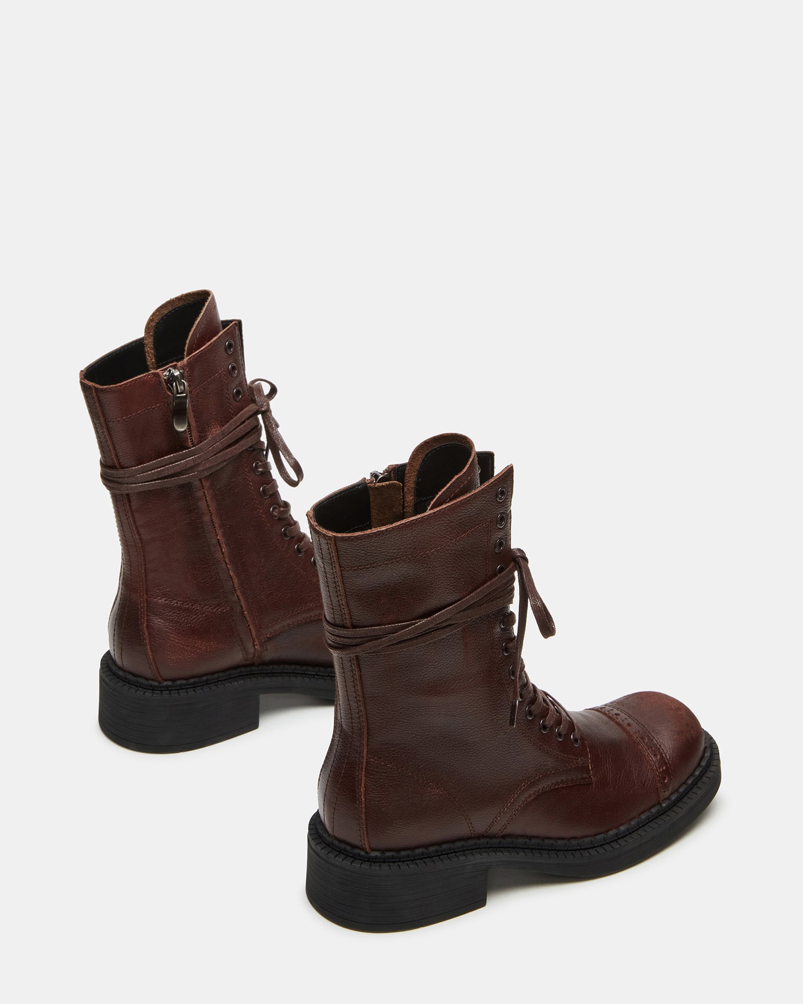 Close-up of leather ankle boots detailing texture and craftsmanship