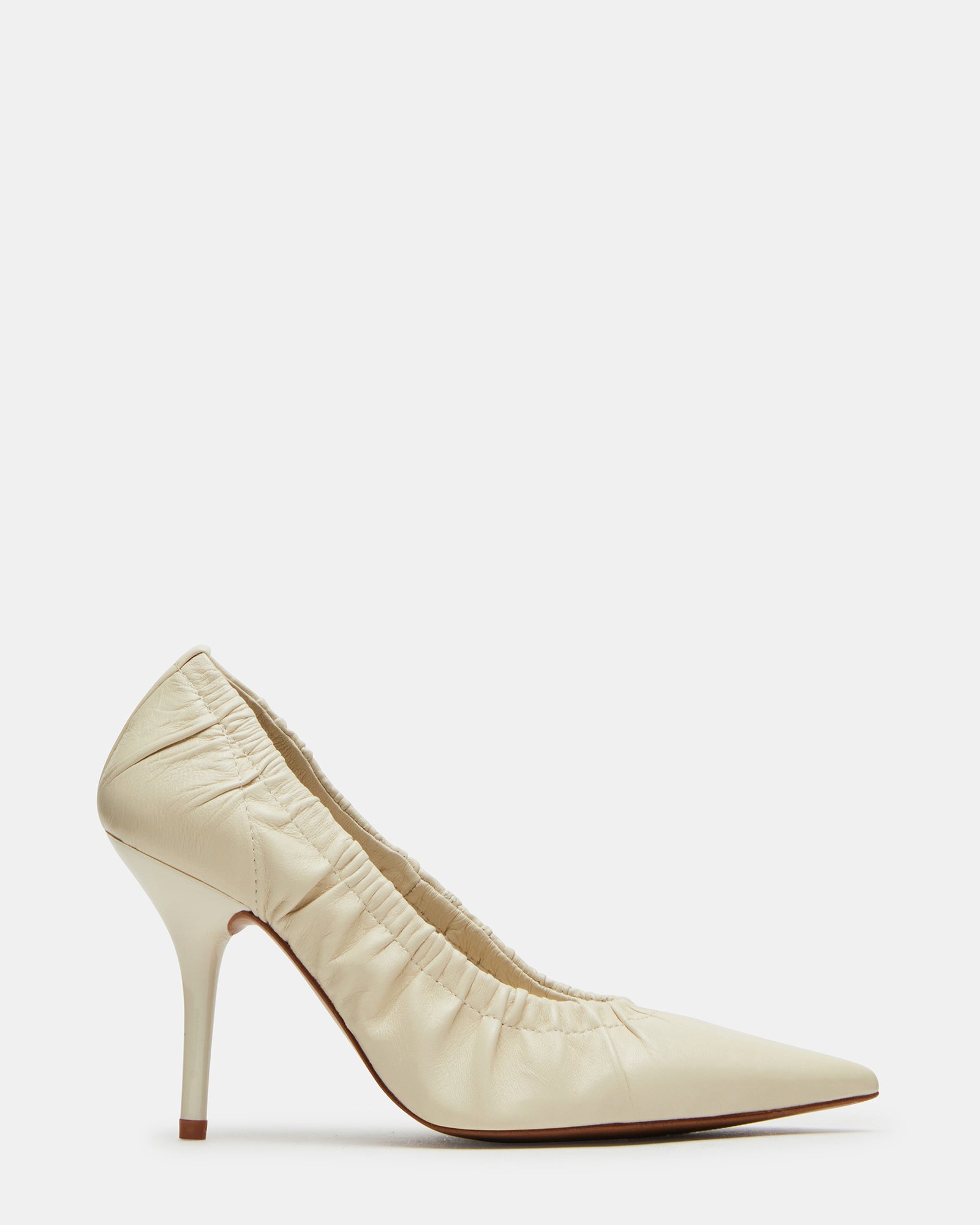 Crinkle bone leather black patent pumps angled on marble steps