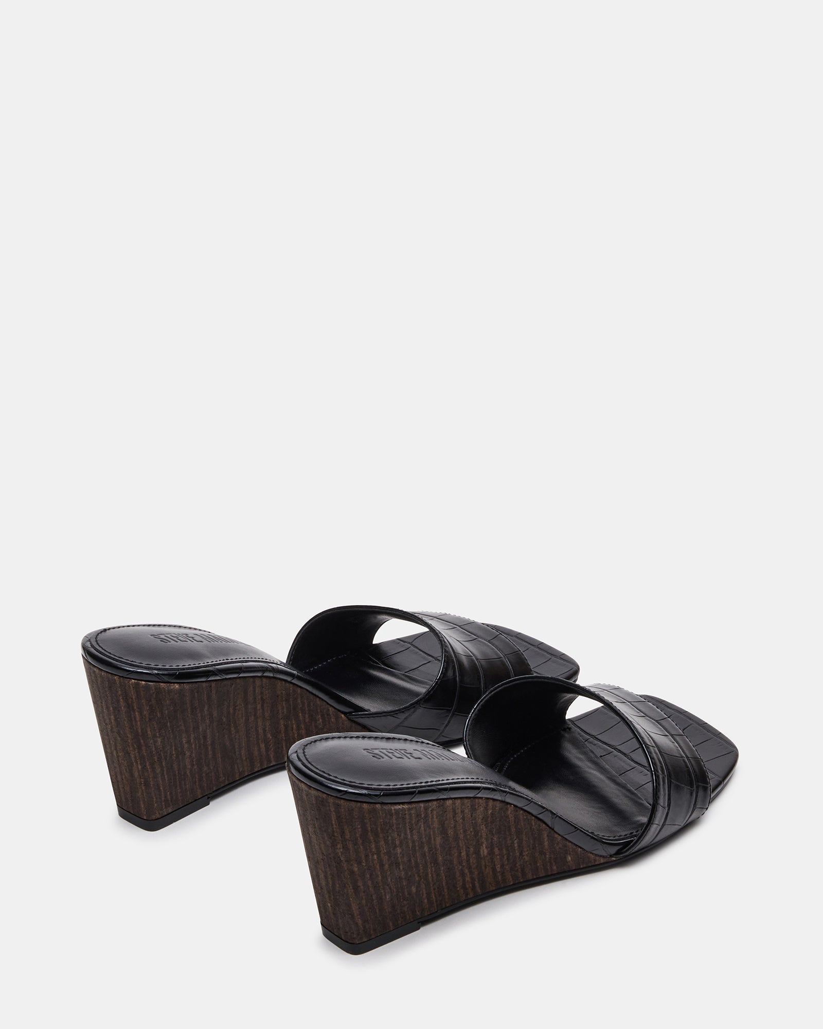 Side view of vegan sandals showcasing the wedge heel design.