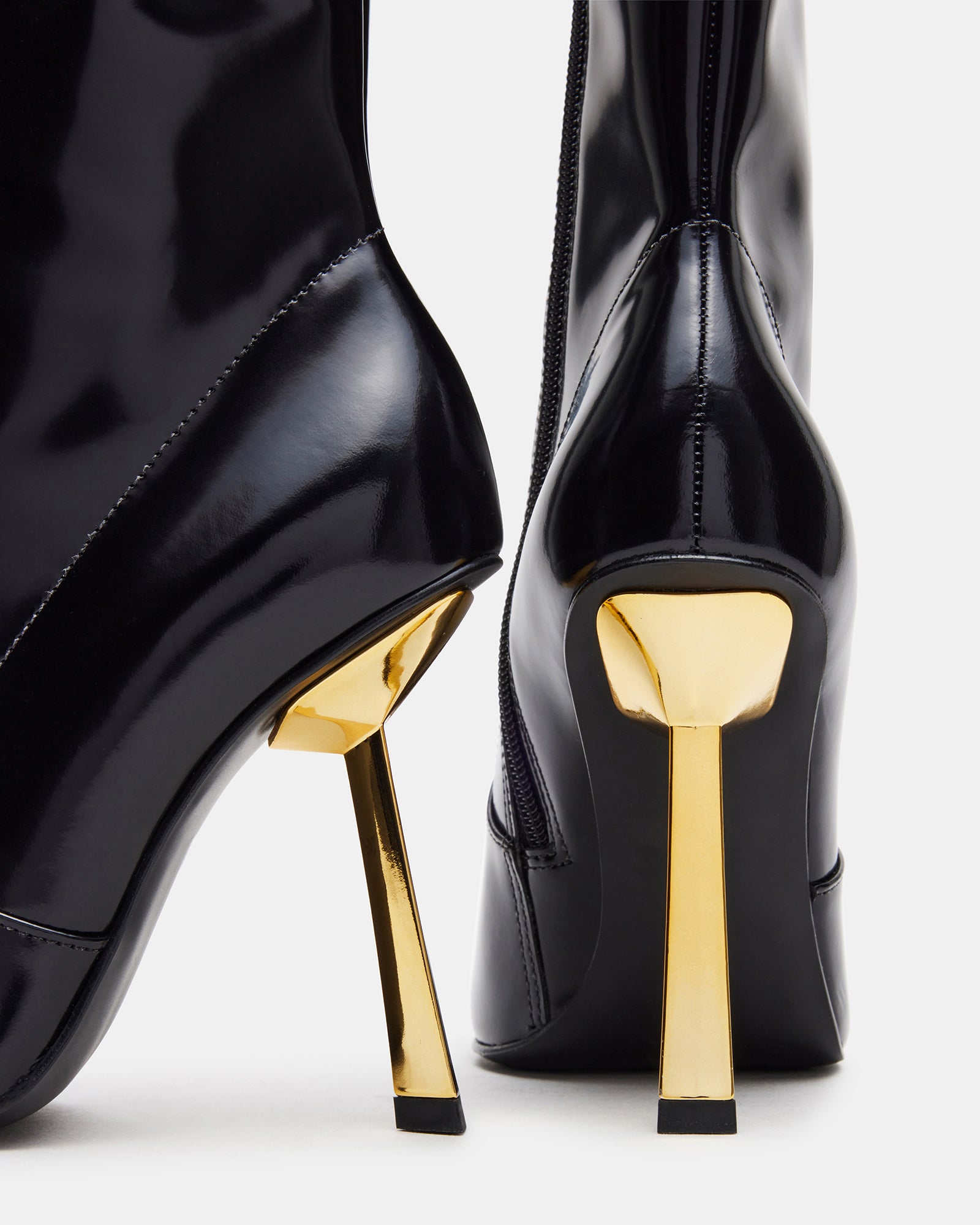 Damian black ankle boots styled with a casual outfit.