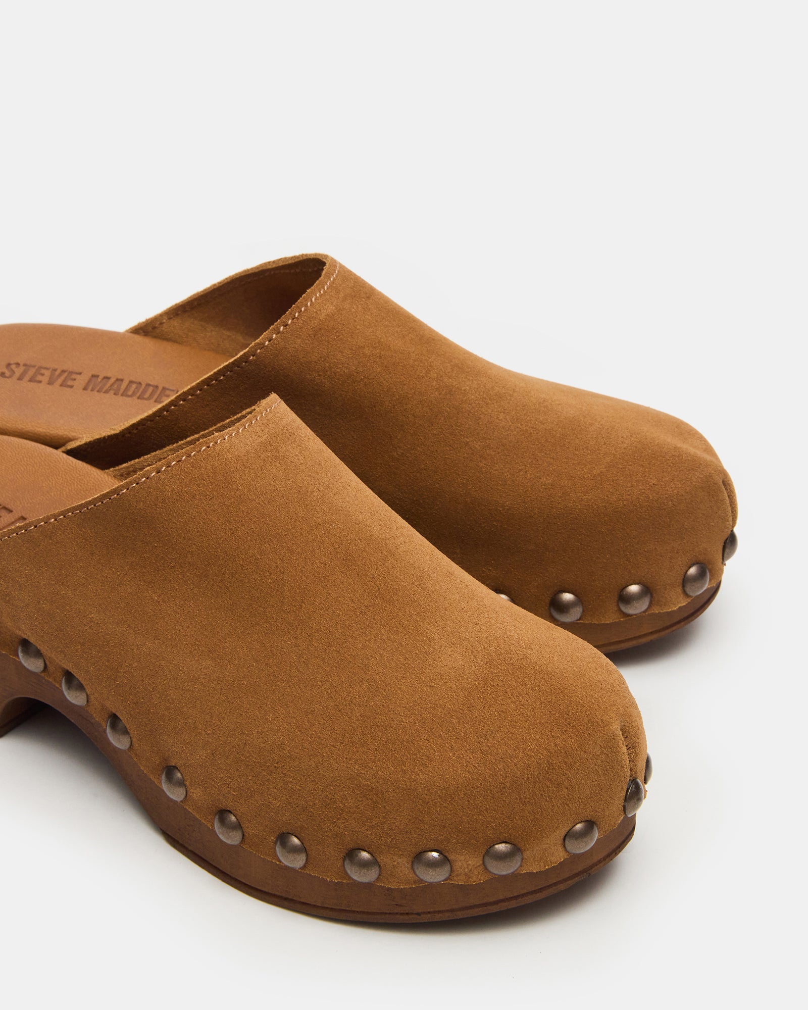 Side view of Danver mule clogs highlighting their comfortable design.