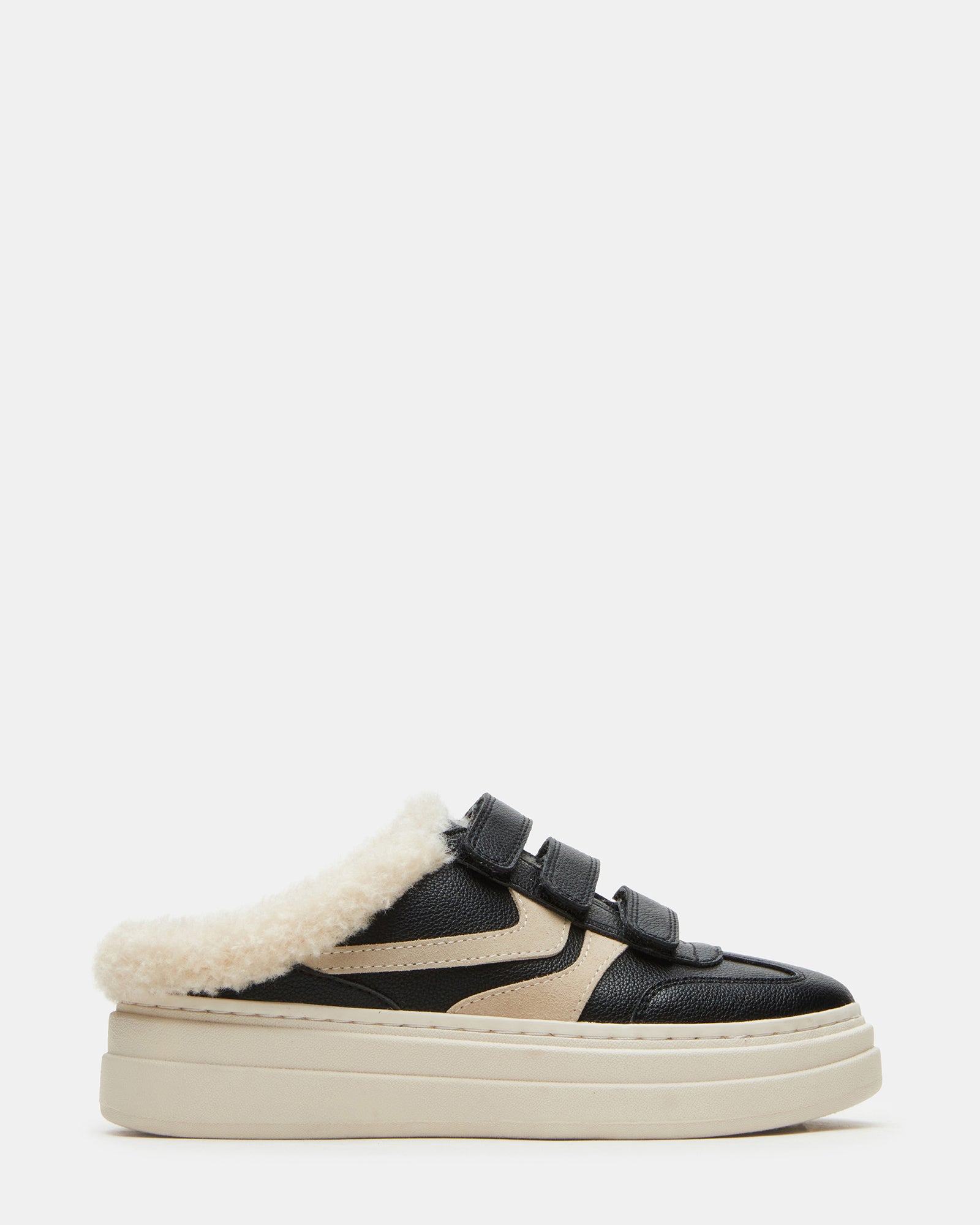 Side view of DASHER black faux fur platform sneakers showcasing the slip-on style and 2-inch heel