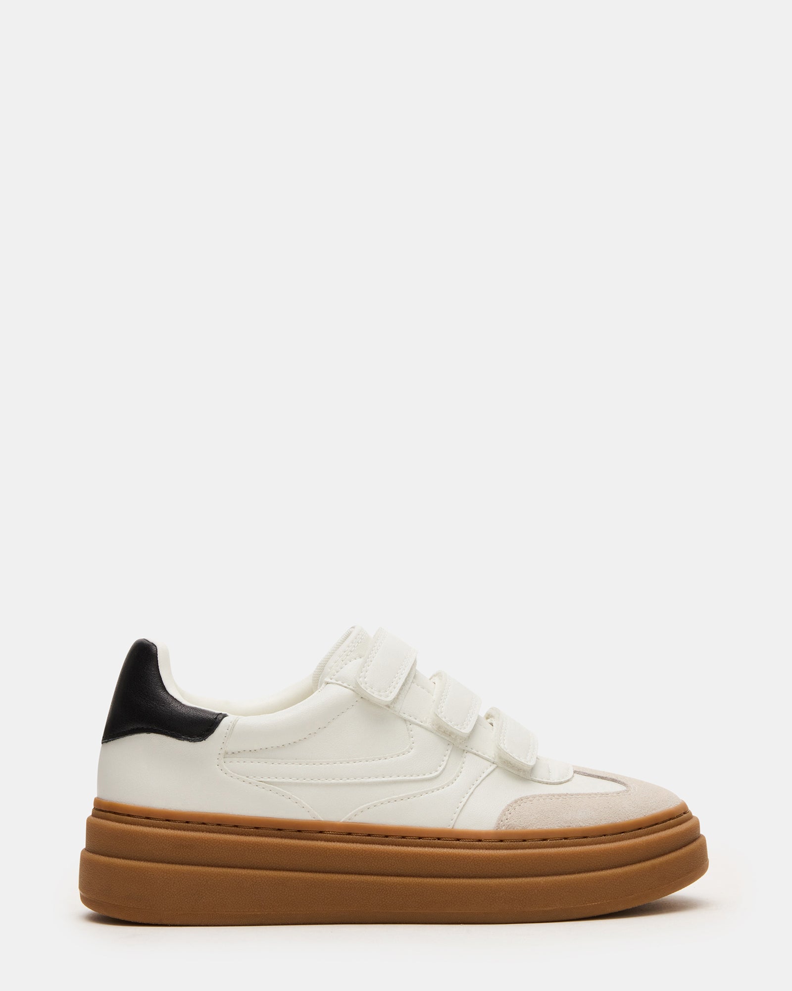 Close-up of DASH white multi platform sneakers with Velcro straps showing the stylish design
