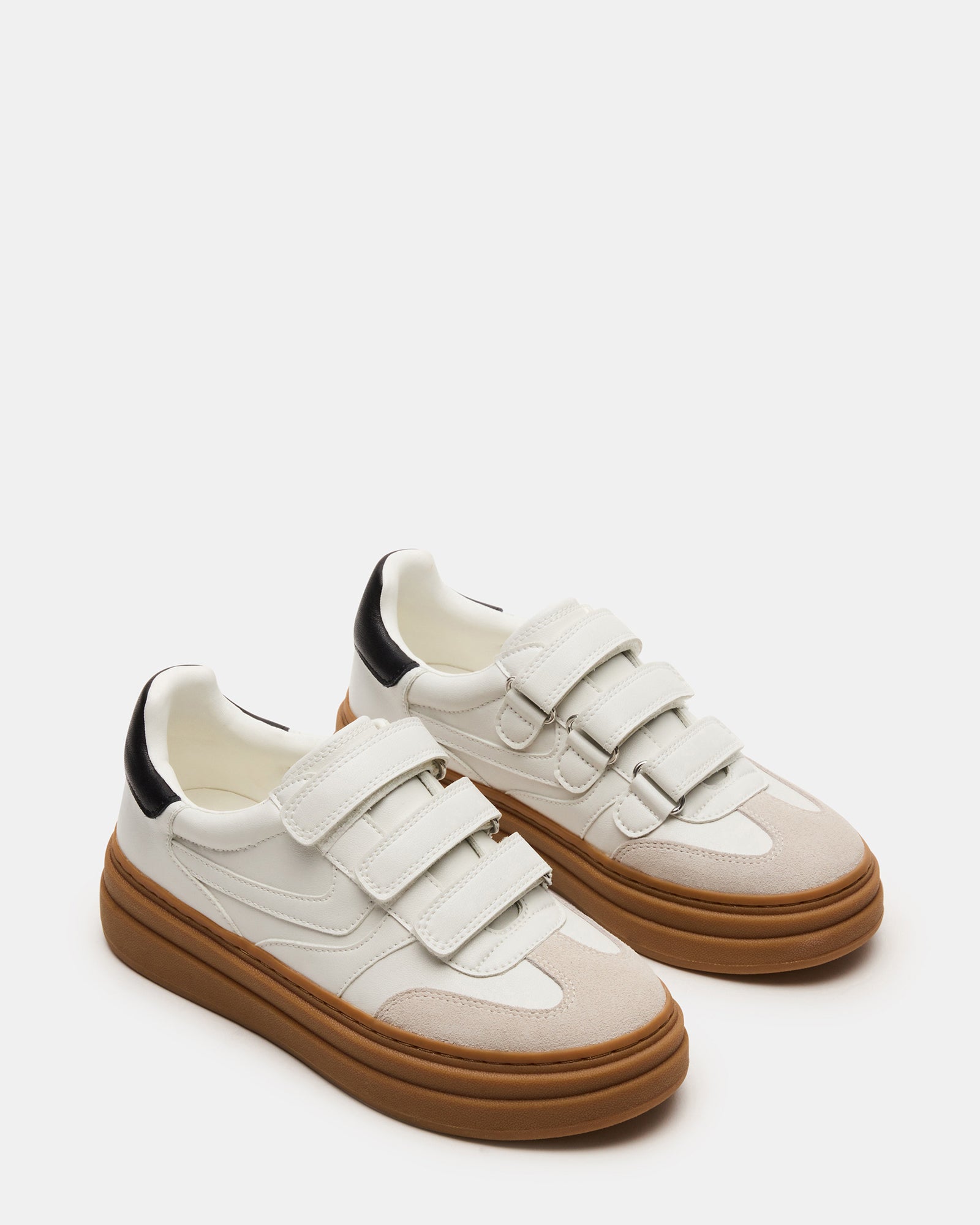 Side view of comfortable women’s platform sneakers with synthetic sole and heel