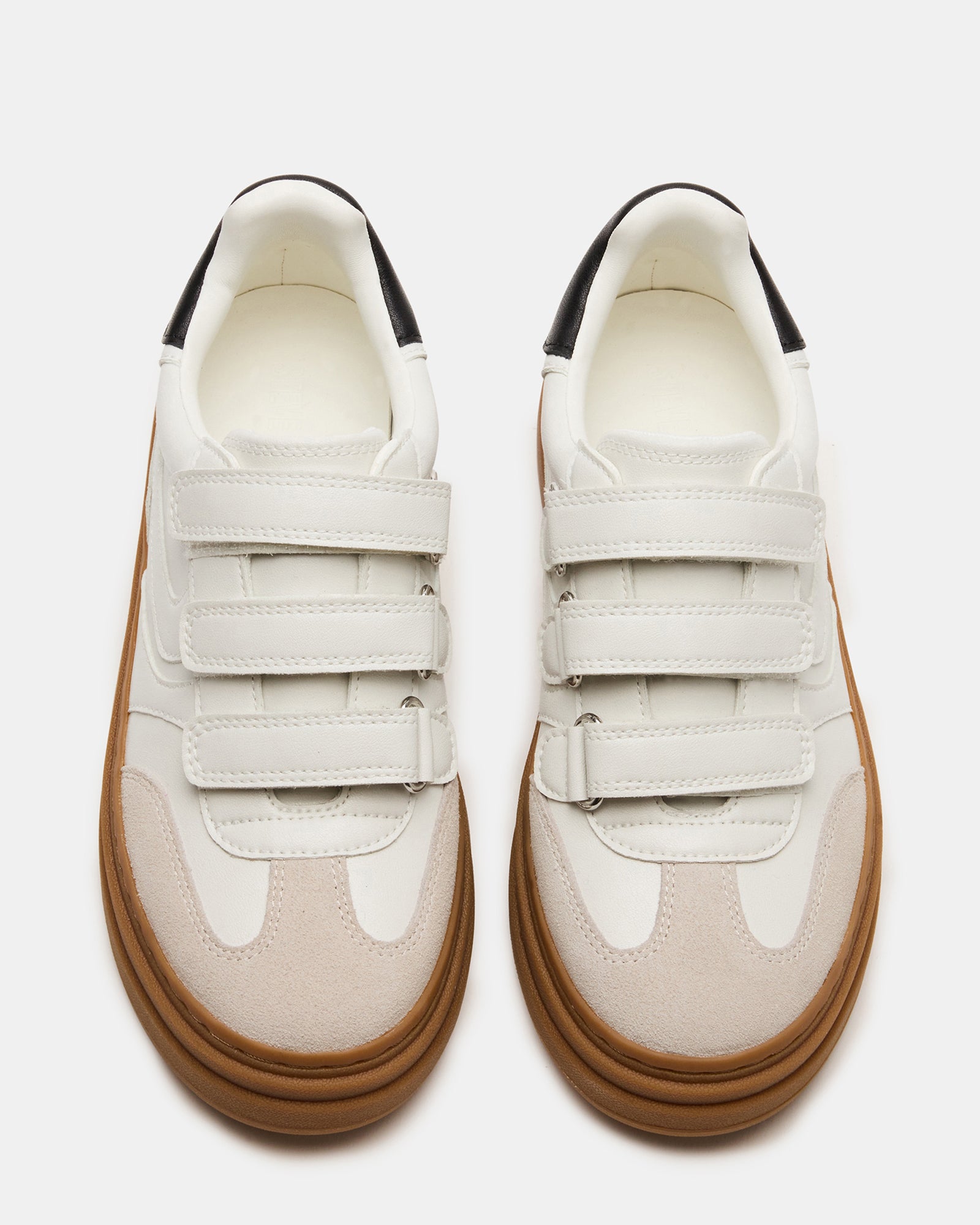 Model wearing DASH platform sneakers with Velcro straps paired with casual outfit