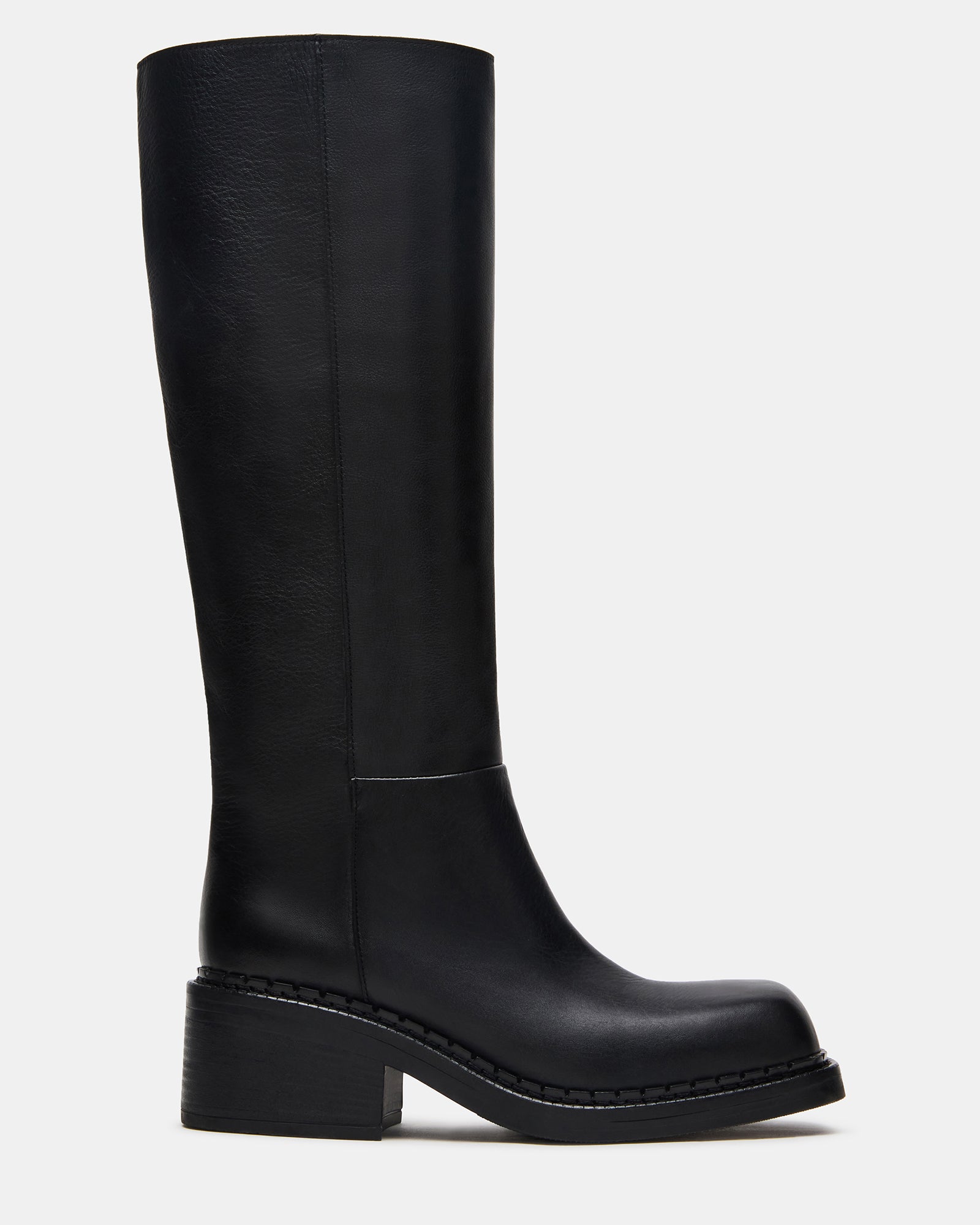Front angle of black ankle boots with block heel for city walking.