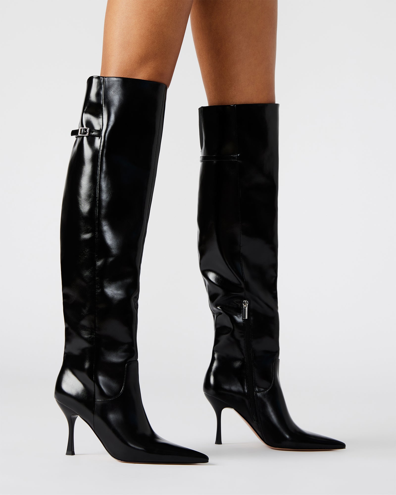Close-up of boot knee high boots heel and stitching detail