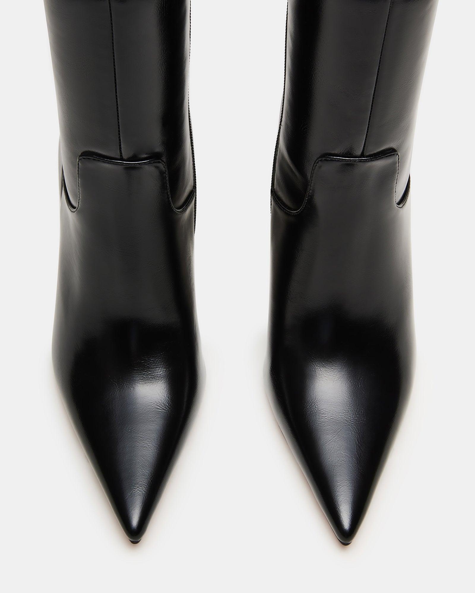 Close-up of boot knee high boots heel and stitching detail