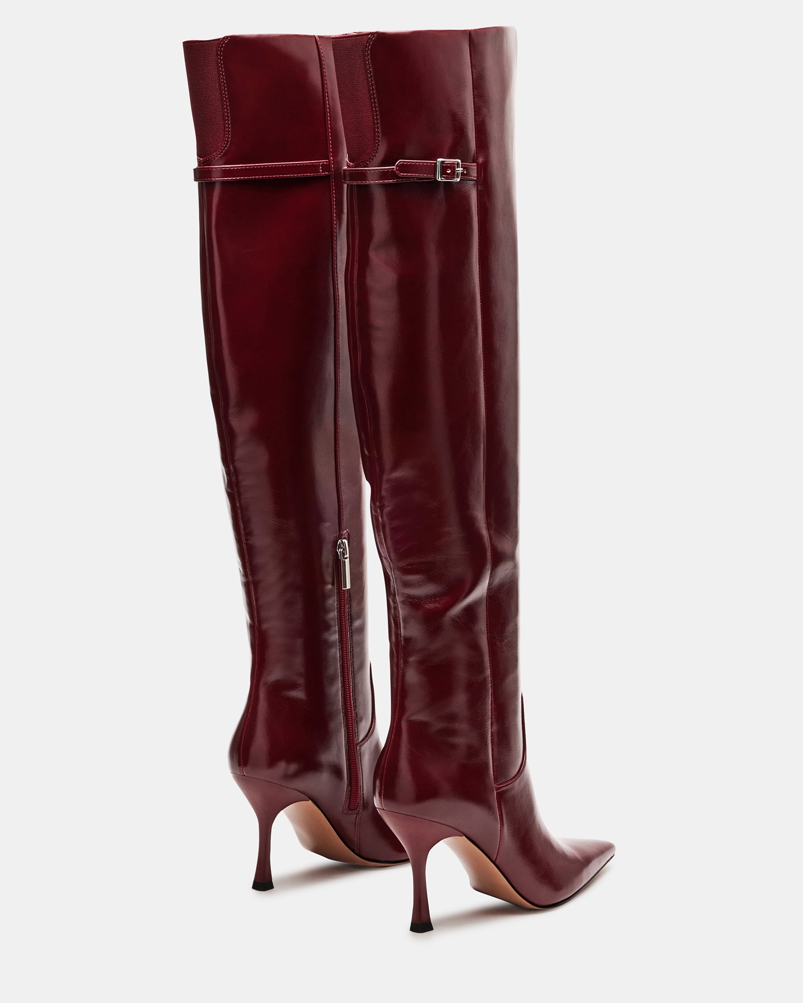 Side view of Dawn Wine vegan leather fashion boots highlighting the shaft height and pointed toe design