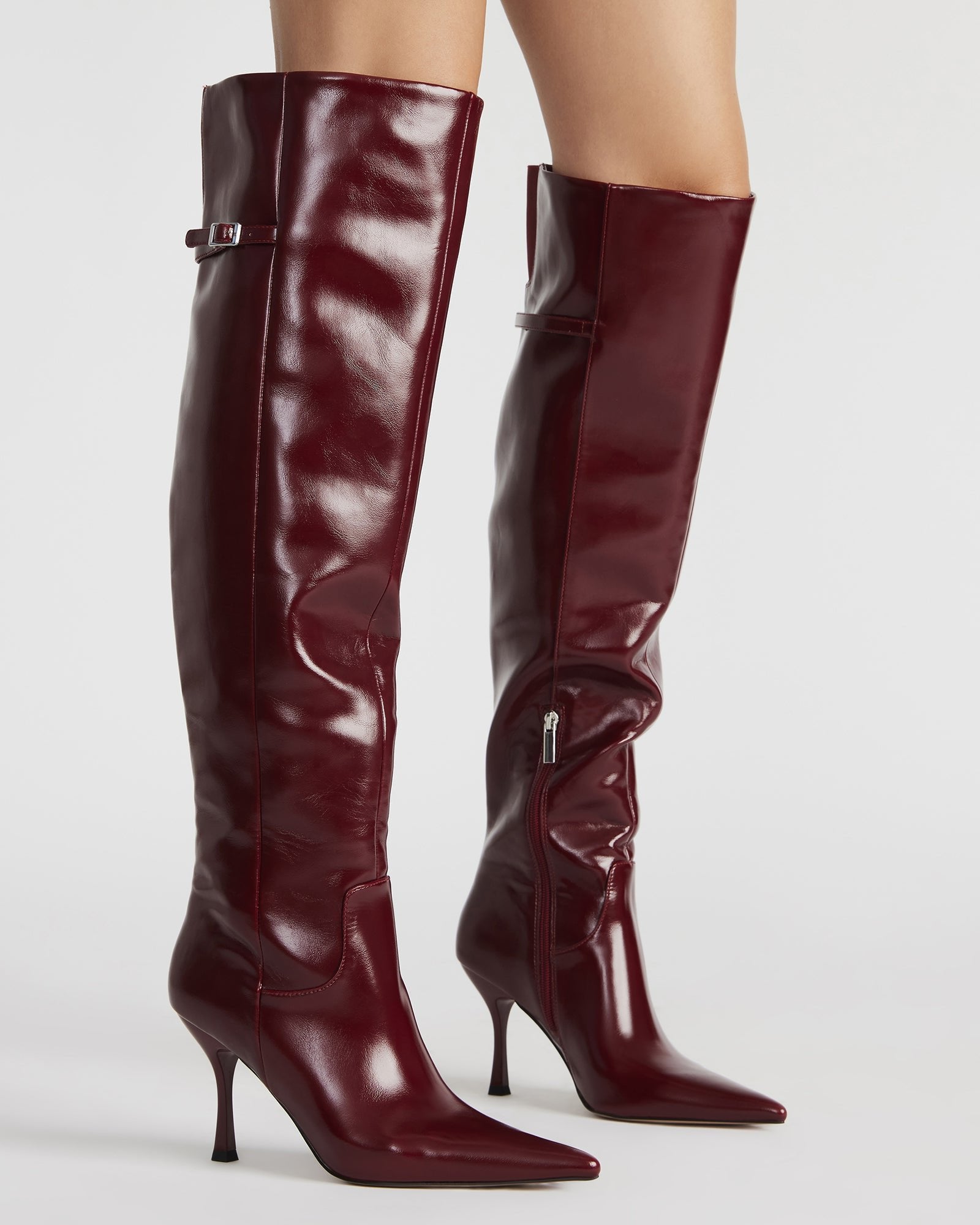 Side view of Dawn Wine vegan leather fashion boots highlighting the shaft height and pointed toe design