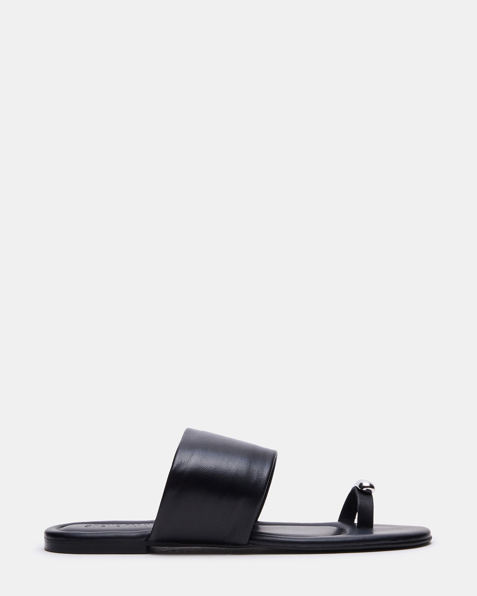 Side view of black leather slide sandals with toe ring detail, perfect for everyday wear