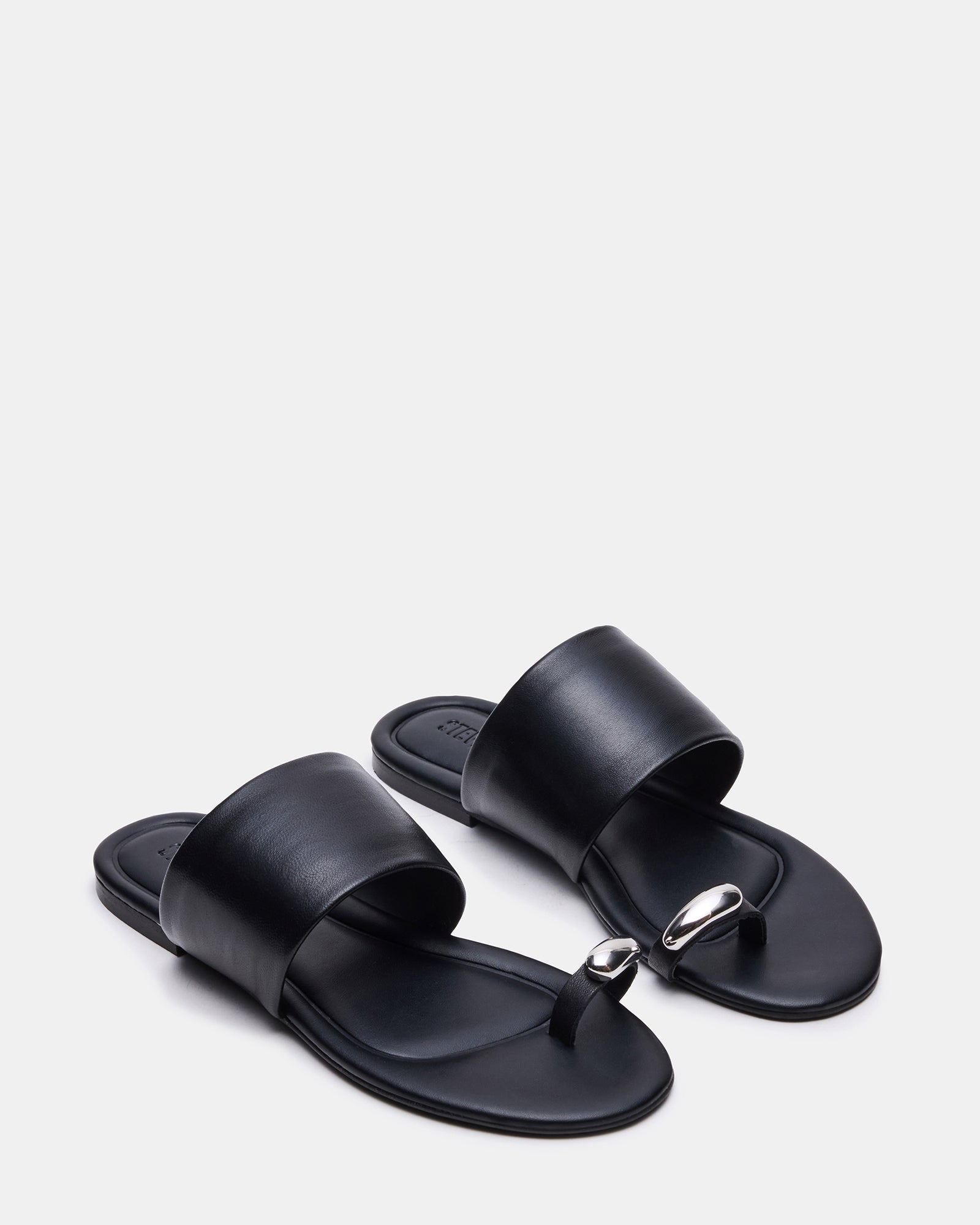 Close-up of the sleek silhouette and synthetic sole of the comfort sandals for women