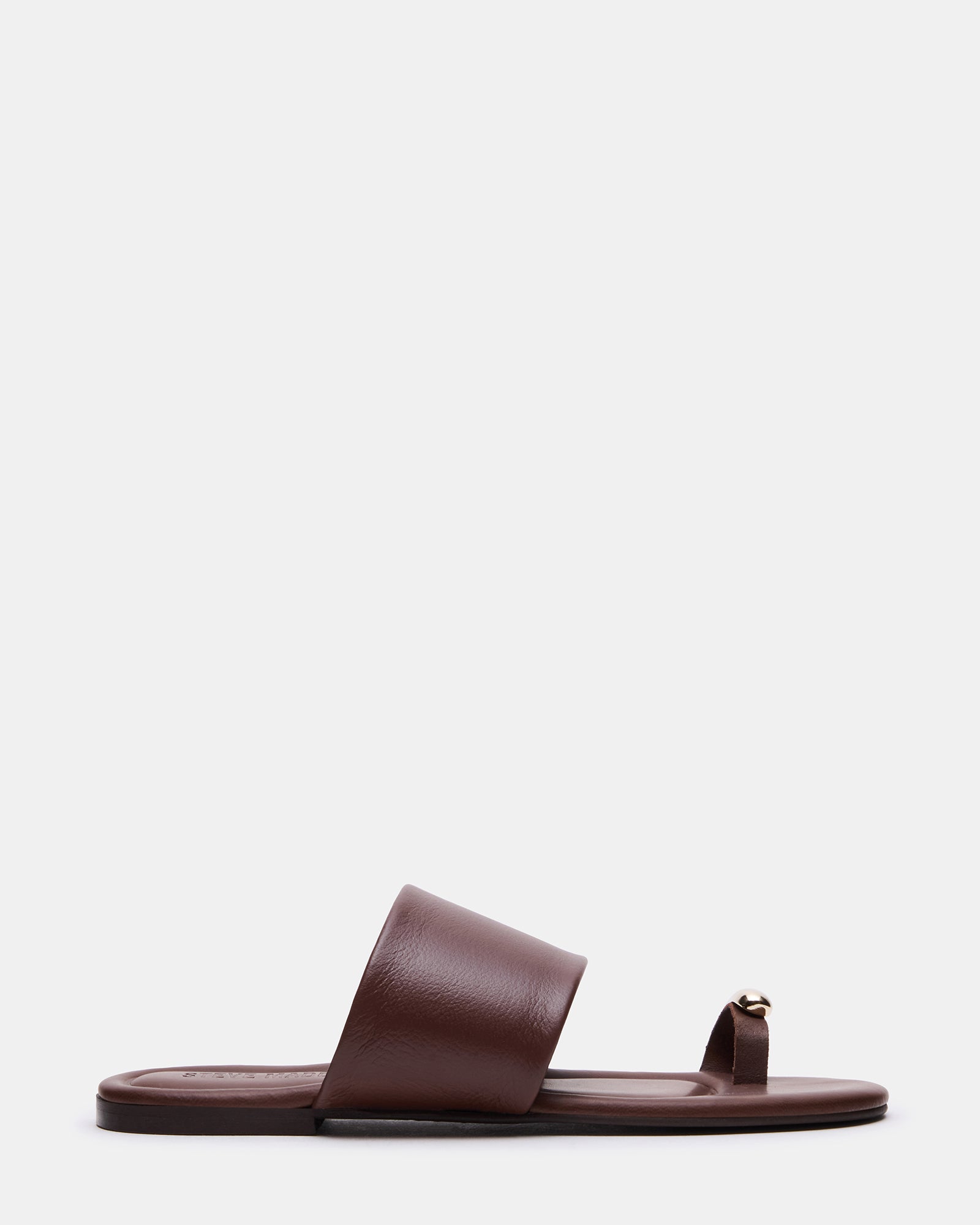 Decadent Brown Leather Slide Sandals with toe ring detail on a model's feet