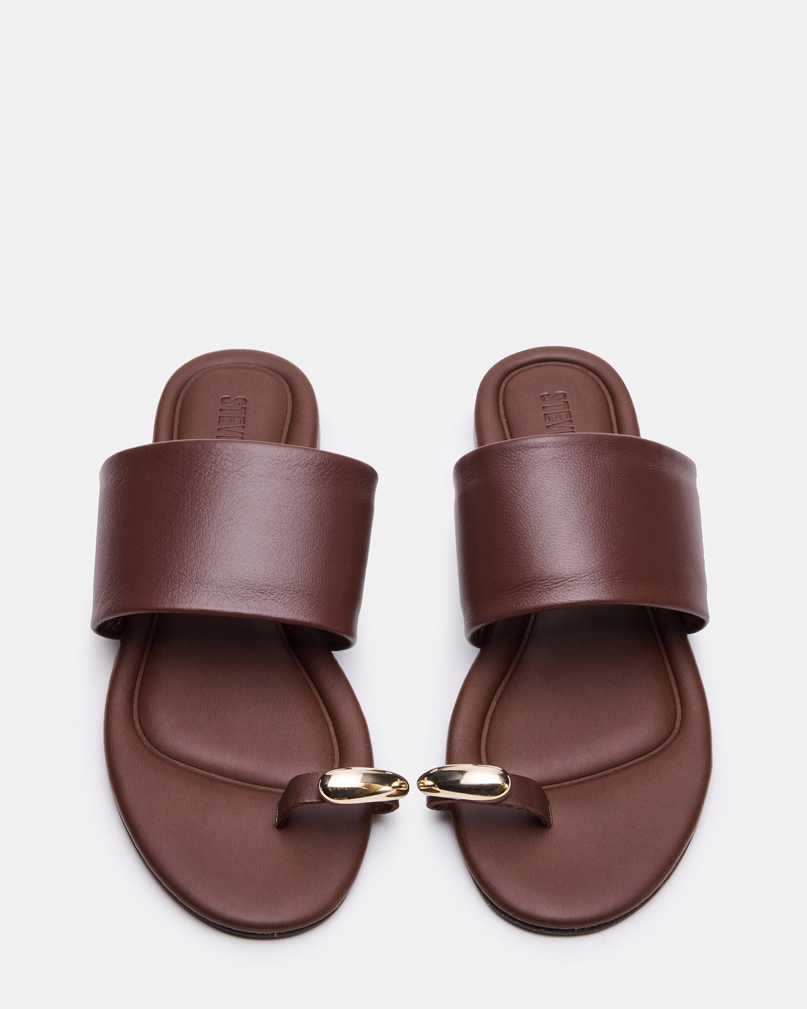 Decadent Brown Leather Slide Sandals with toe ring detail on a models feet