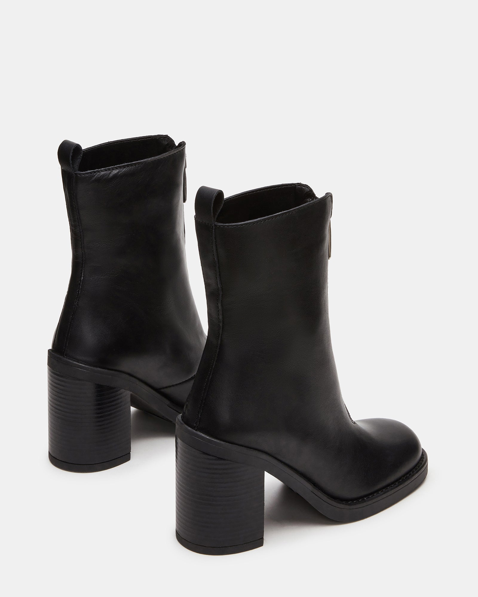 Declan ankle boots styled with skinny jeans, photographed on Boston cobblestone streets
