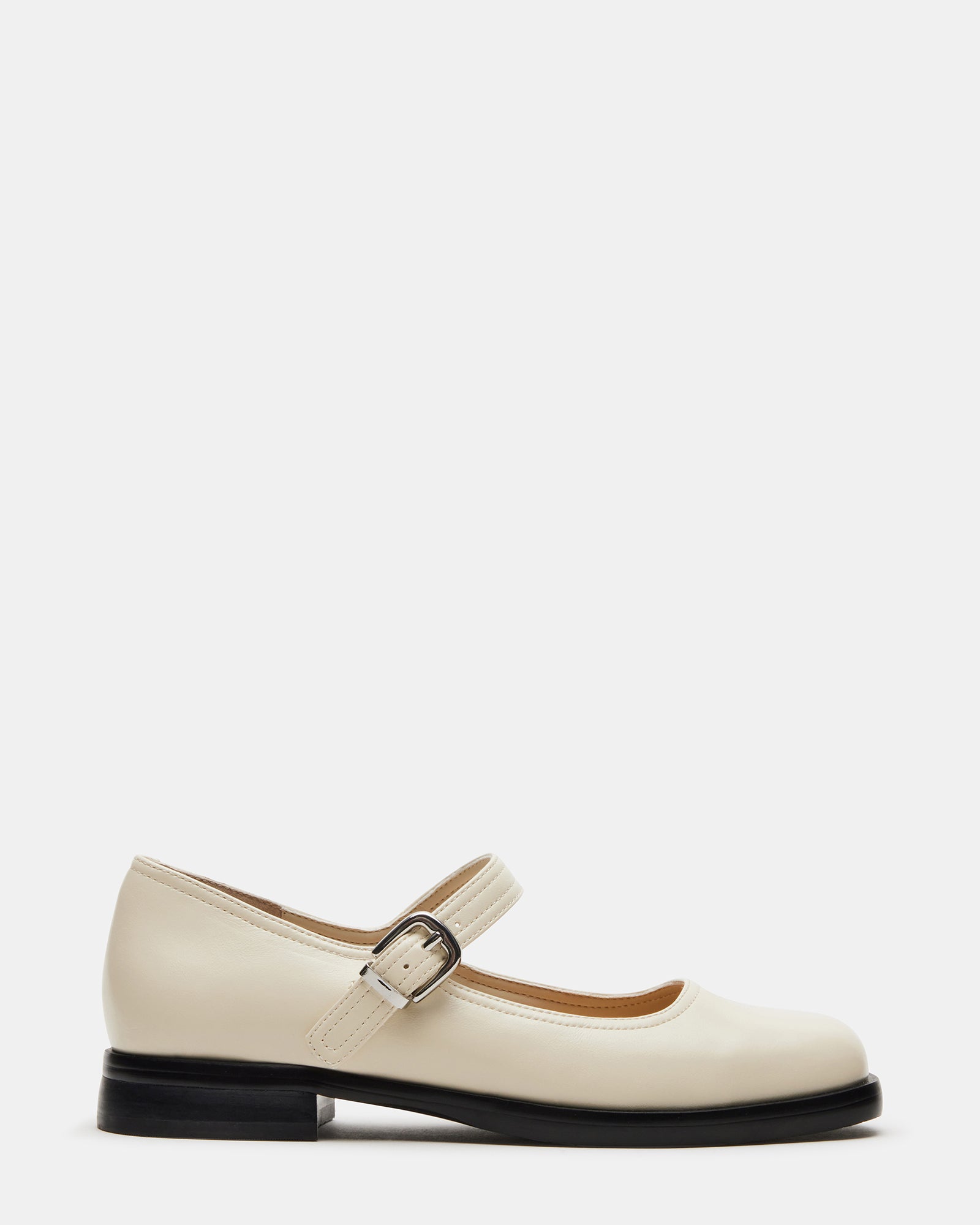 Delancy brown leather flats from side angle, showcasing square toe design.