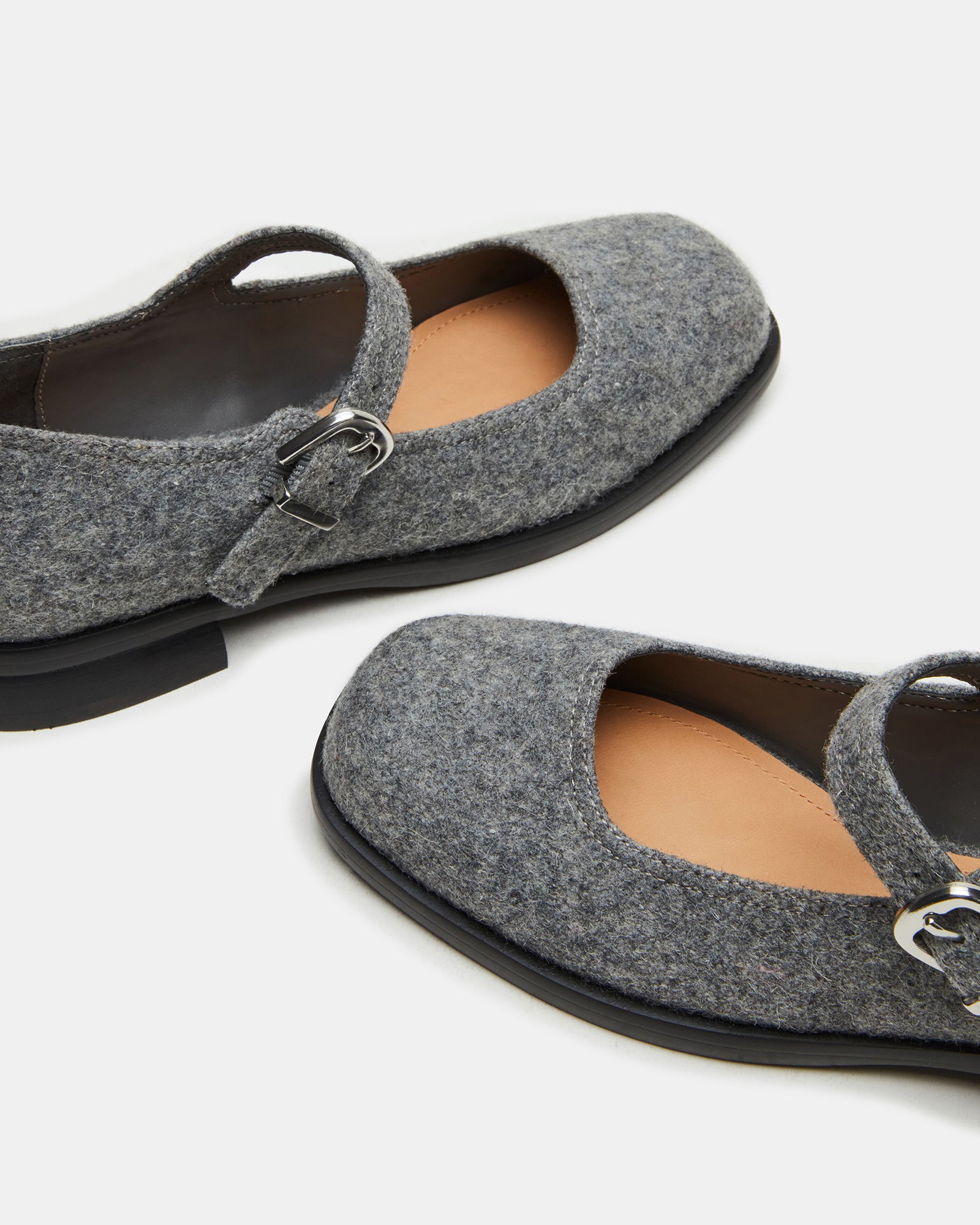 Outfit pairing featuring these versatile Mary Janes with jeans and a blazer