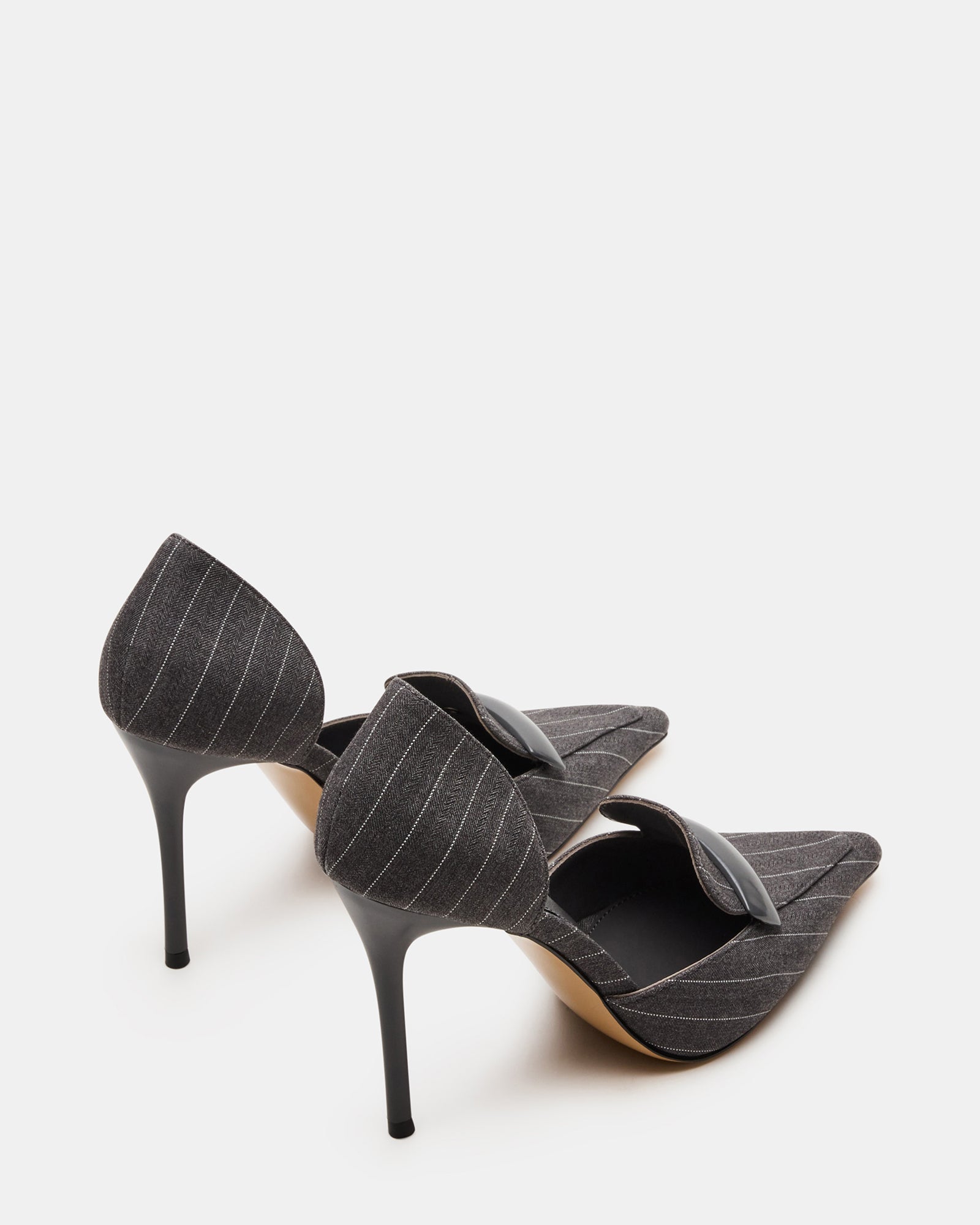 Top-down shot of the shoes emphasizing the elegant pinstripe pattern and heel height