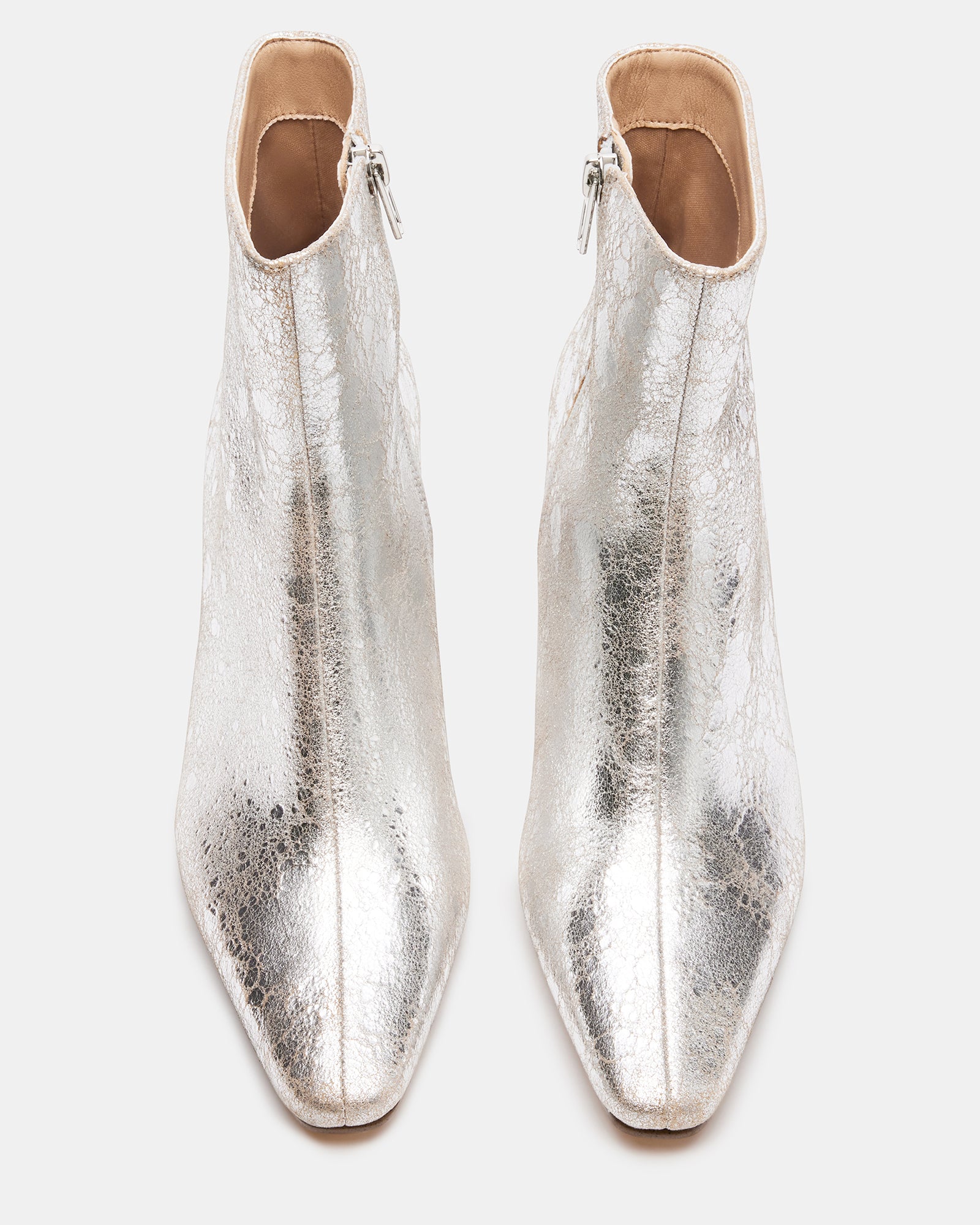 Side view of silver leather ankle boots showing the 2-inch kitten heel