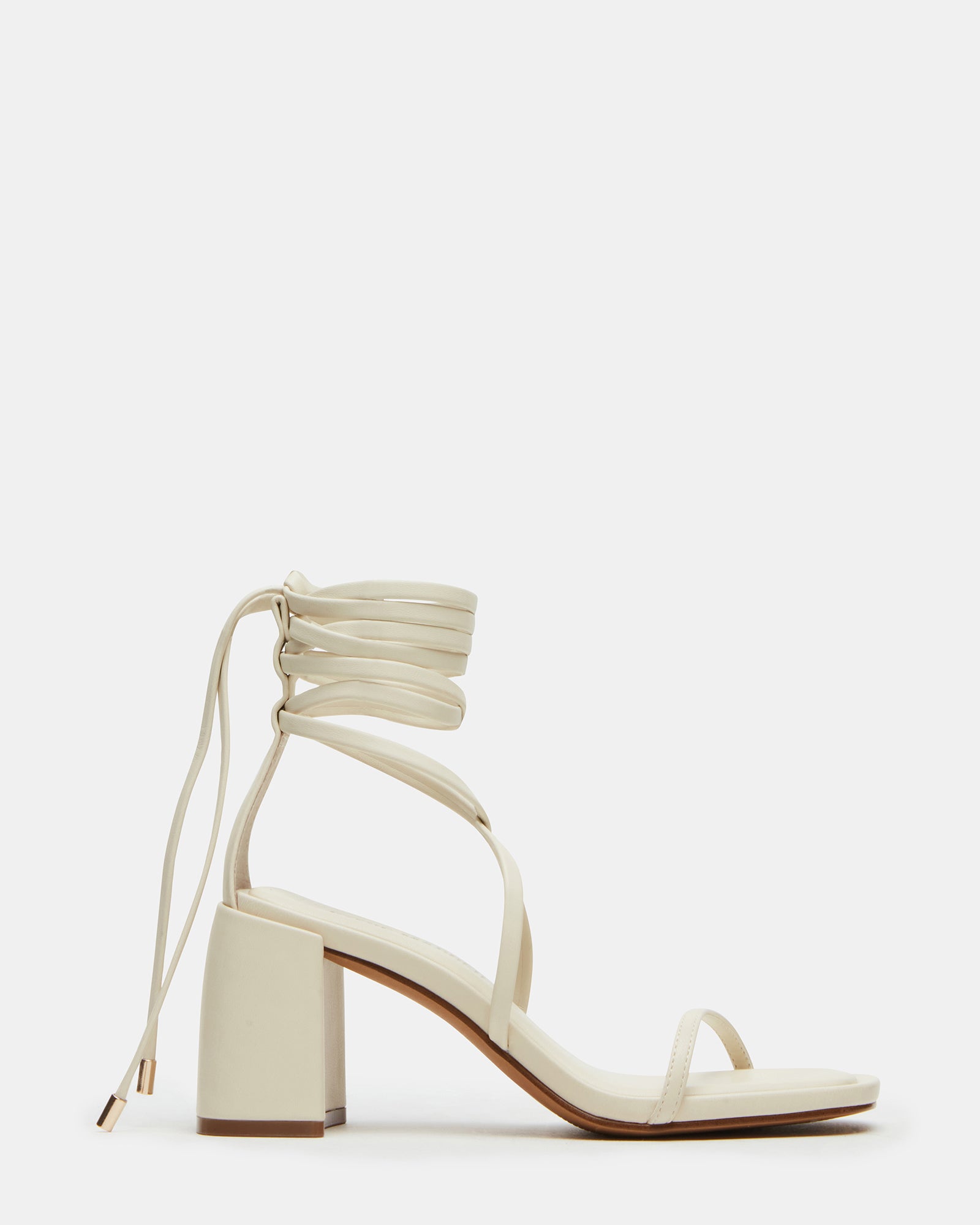 Close-up of Demure Bone strappy heels showing square toe and lace-up detail