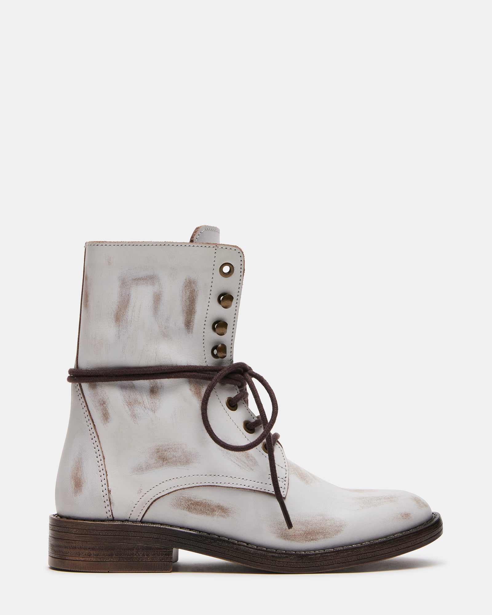 Side view of DEVIE brown leather booties showcasing the laced closure.