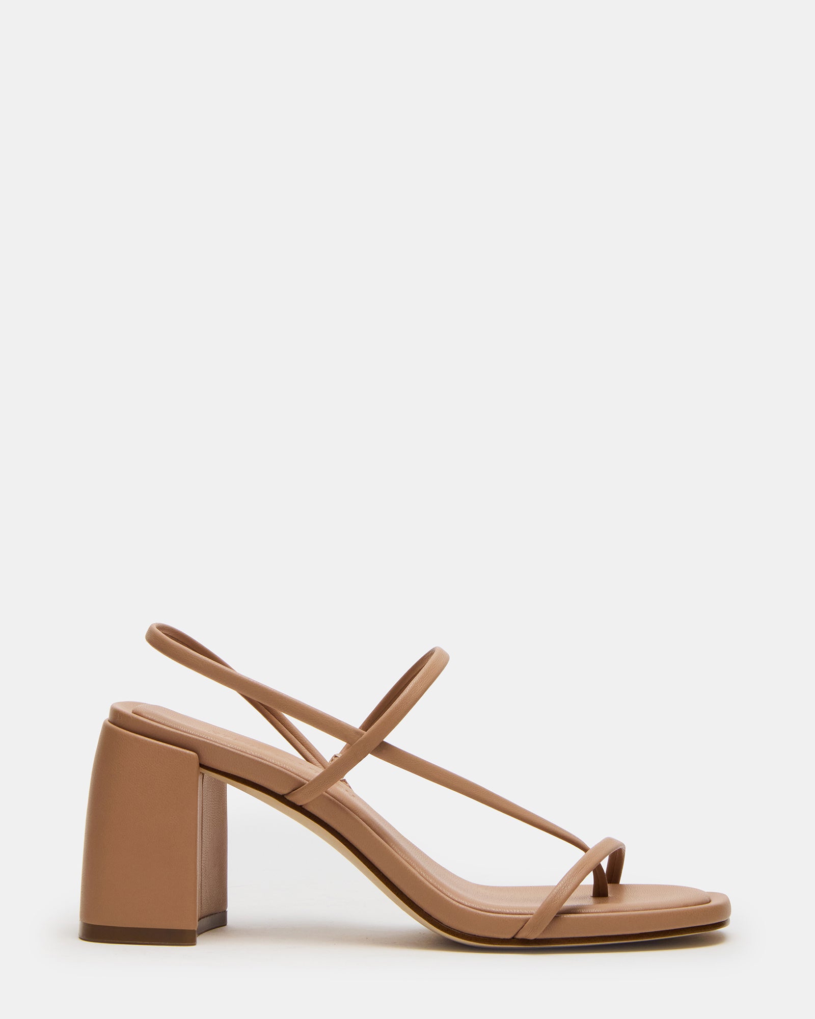 DIORA NATURAL strappy black heels styled with midi dress for evening wear