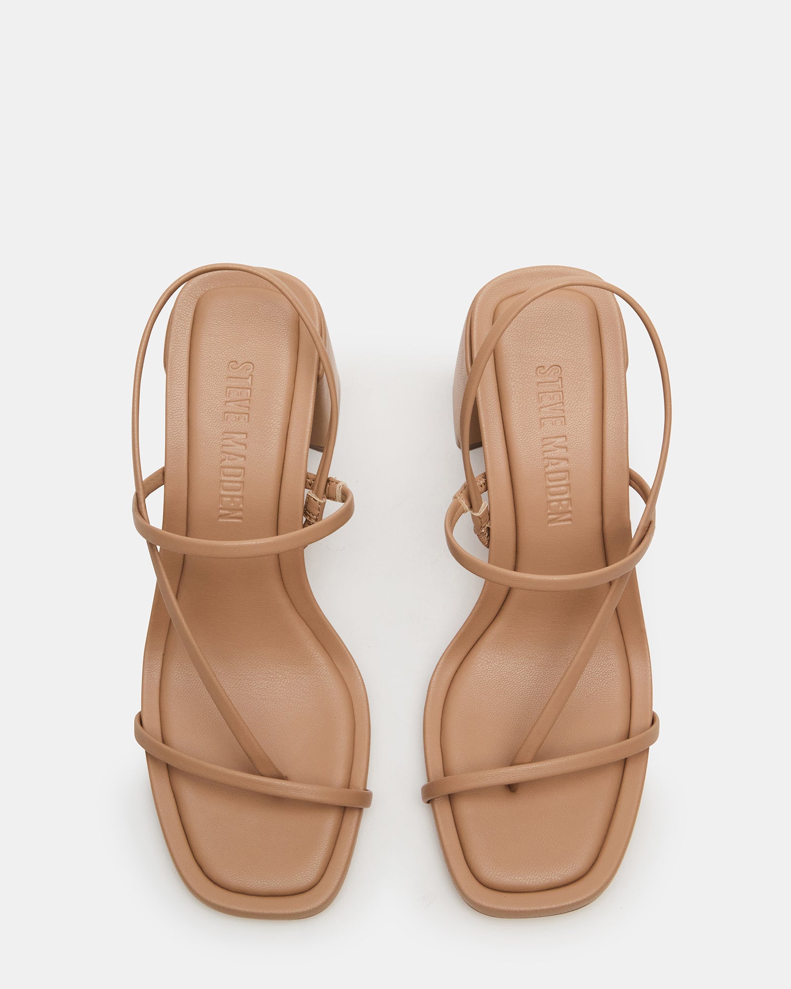 Close-up of vegan leather block heel shoes showing square toe detail