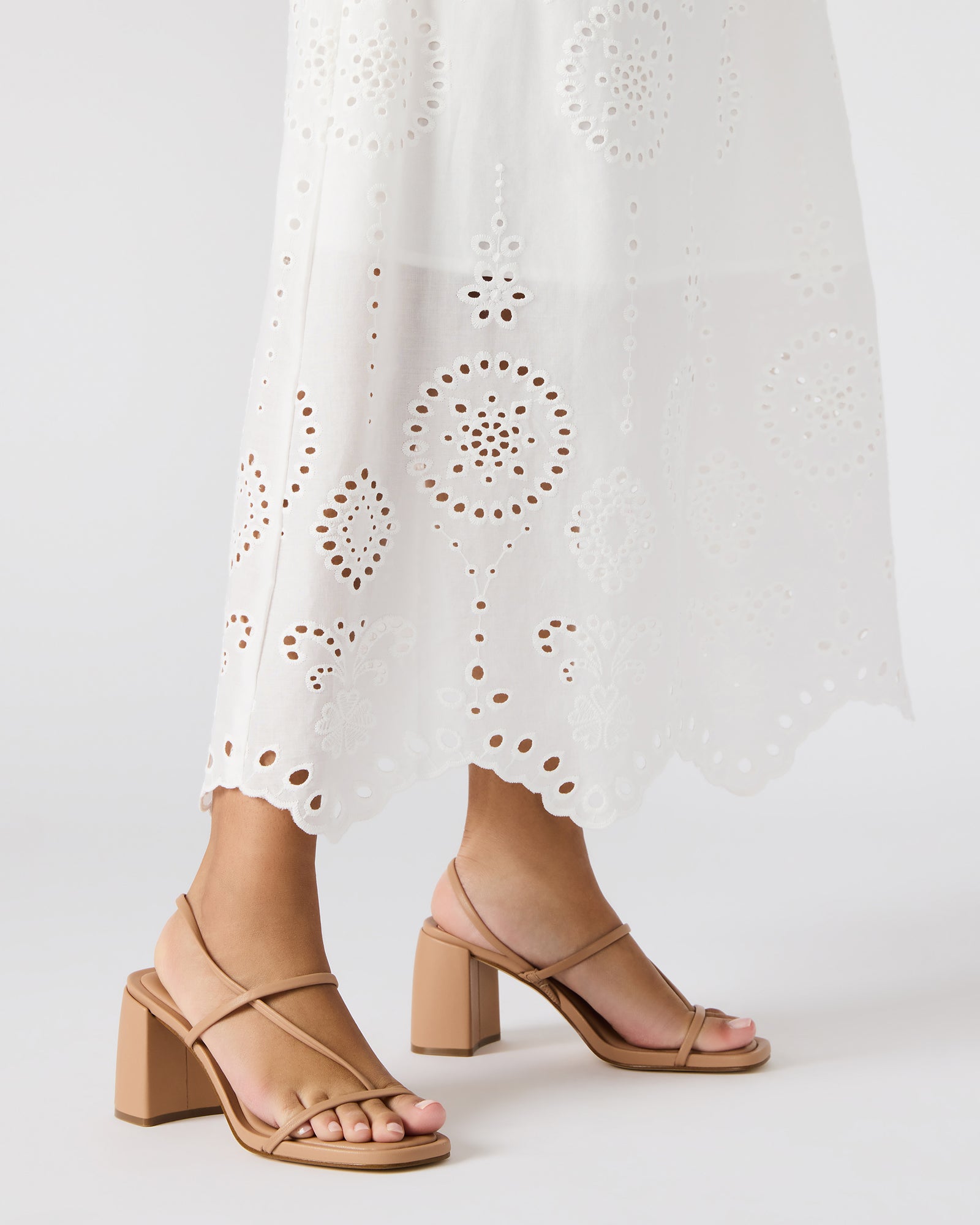 Close-up of vegan leather block heel shoes showing square toe detail