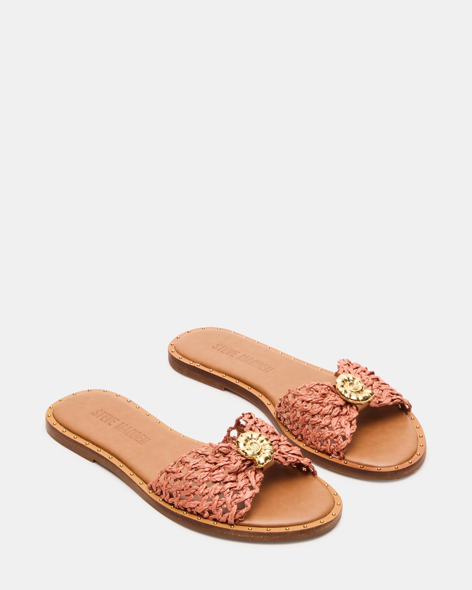 Side angle of comfortable sandals featuring low heel and flexible sole