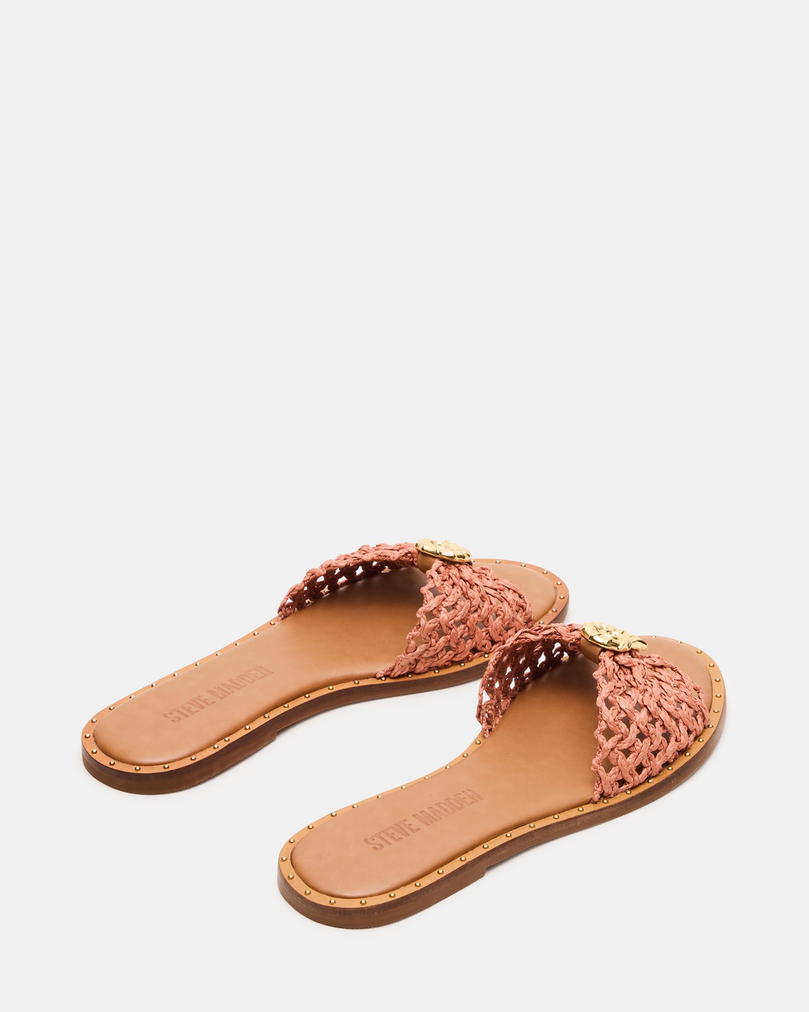 Side angle of comfortable sandals featuring low heel and flexible sole