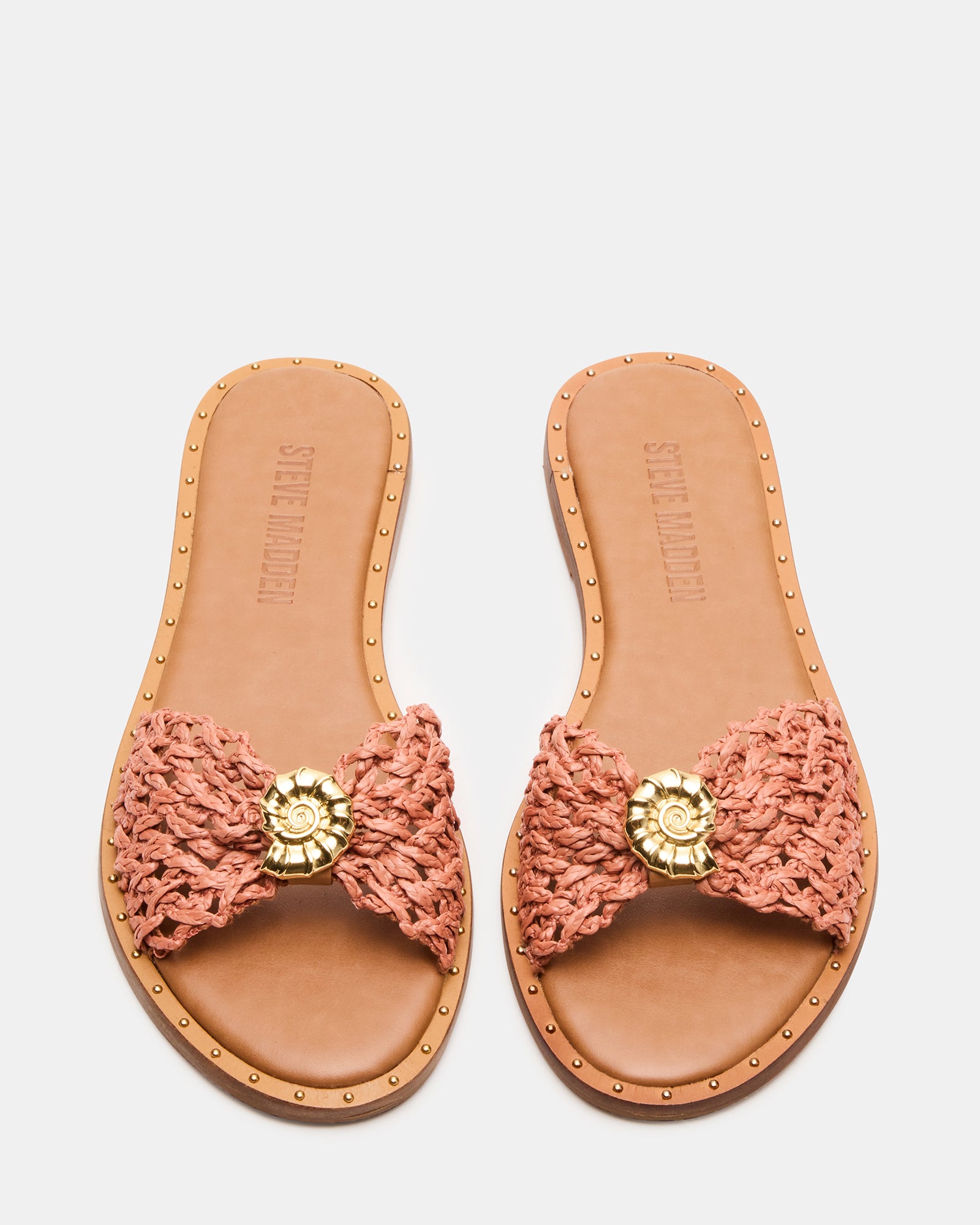 Top view of fashion sandals showcasing suede texture and metallic studs