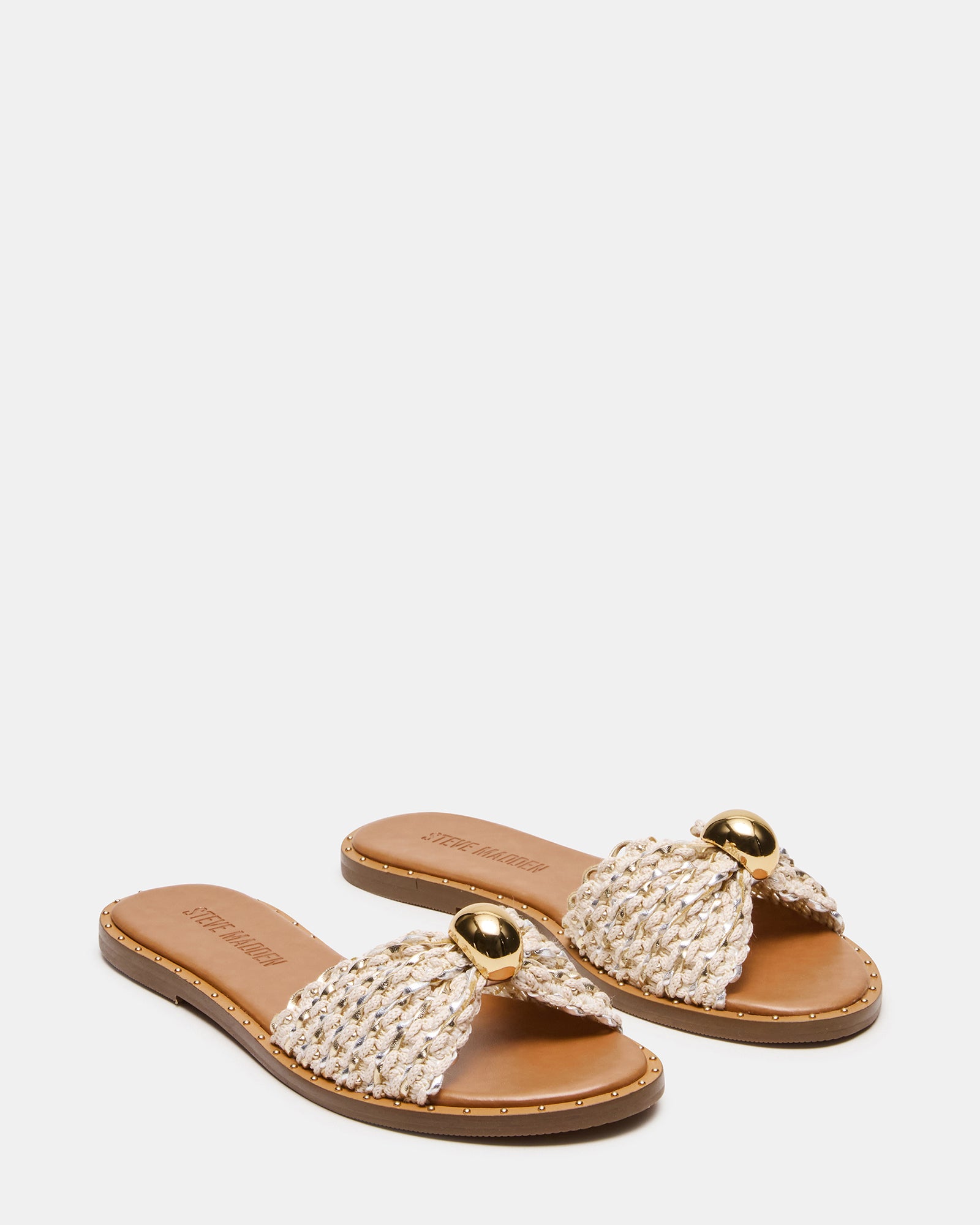 Casual outfit pairing featuring slides sandals with jeans for everyday wear