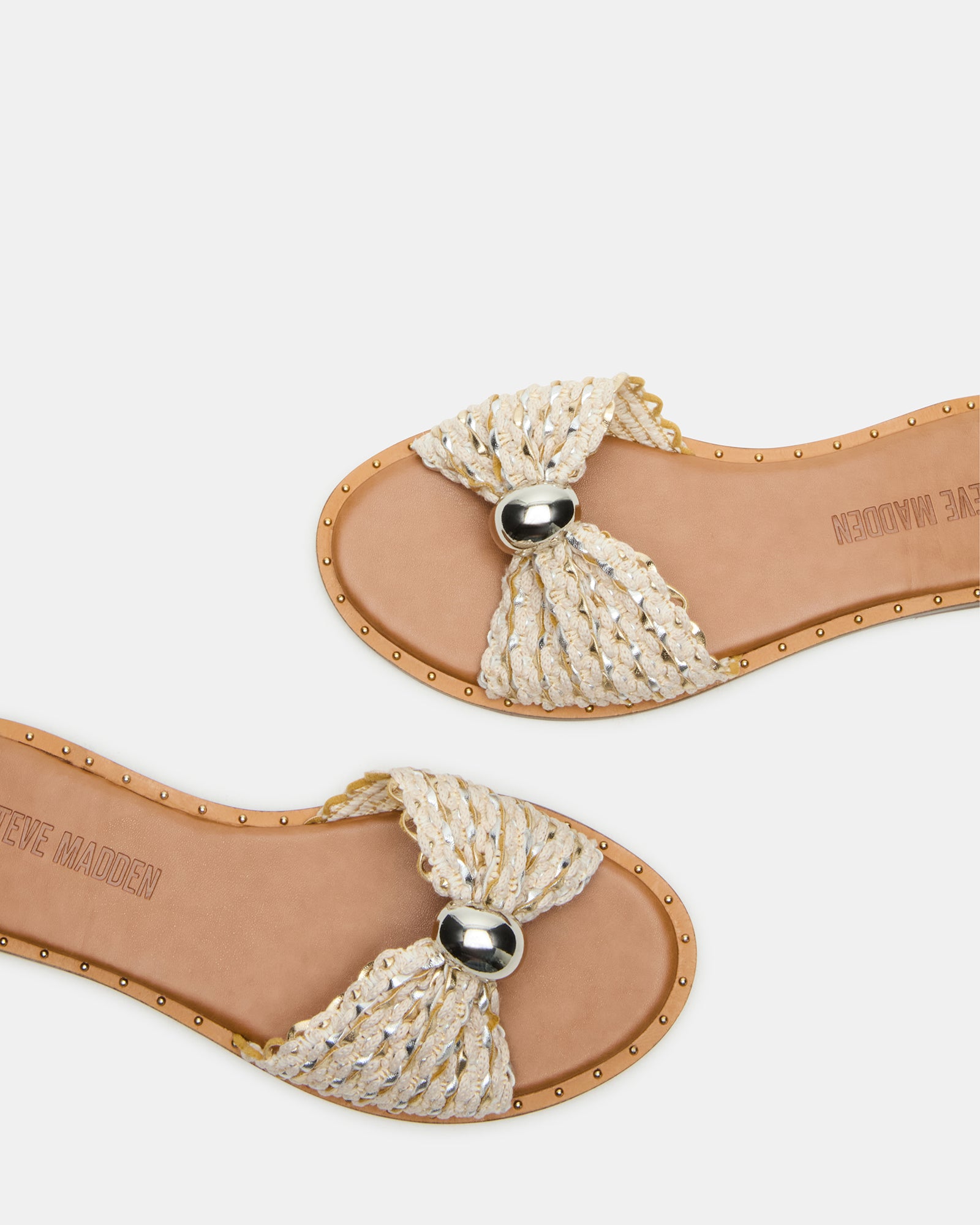Dipsy slide sandals in metallic multi-color, showcasing studded design and rounded toe