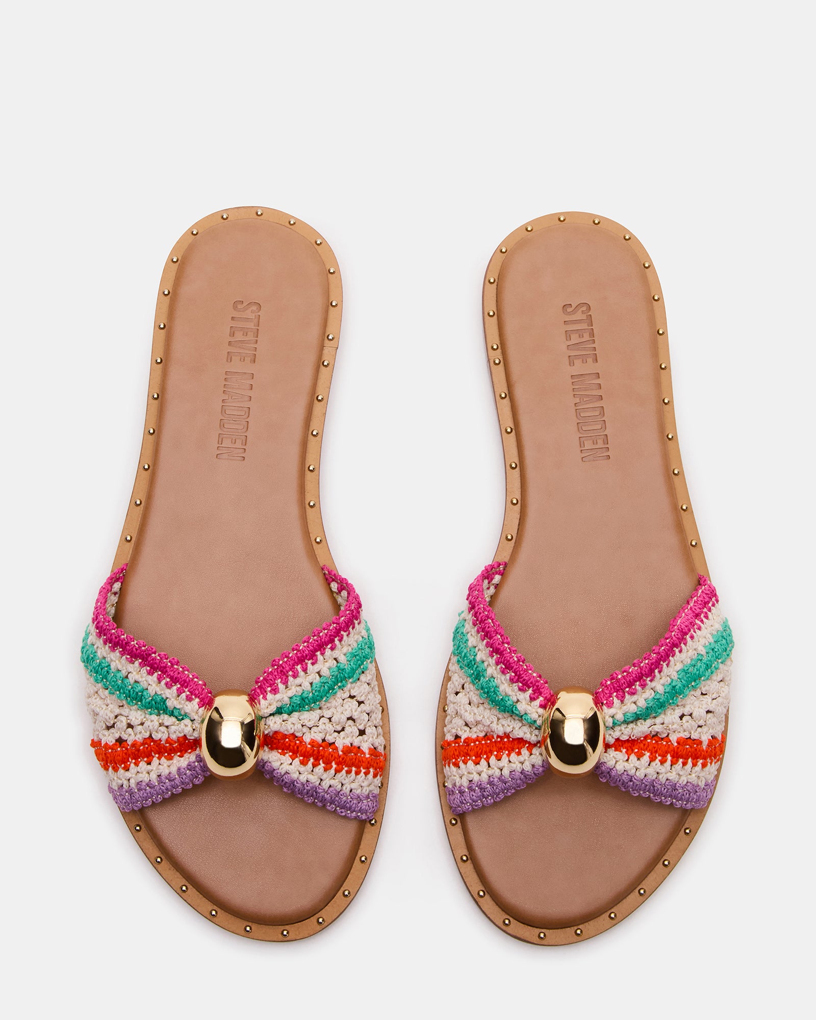 Close-up of mini stud details on raffia sandals