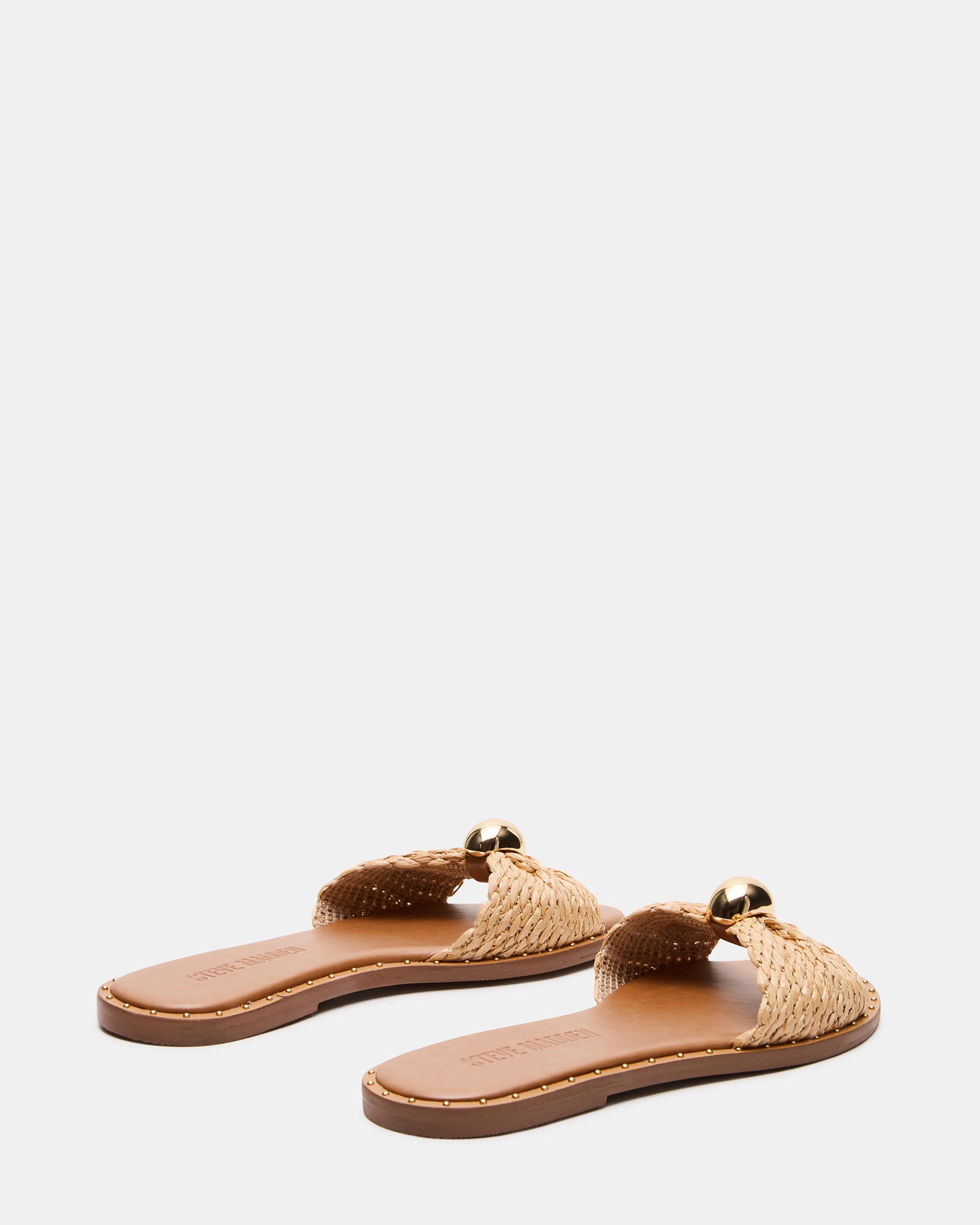 DIPSY raffia sandals worn at a casual summer event.