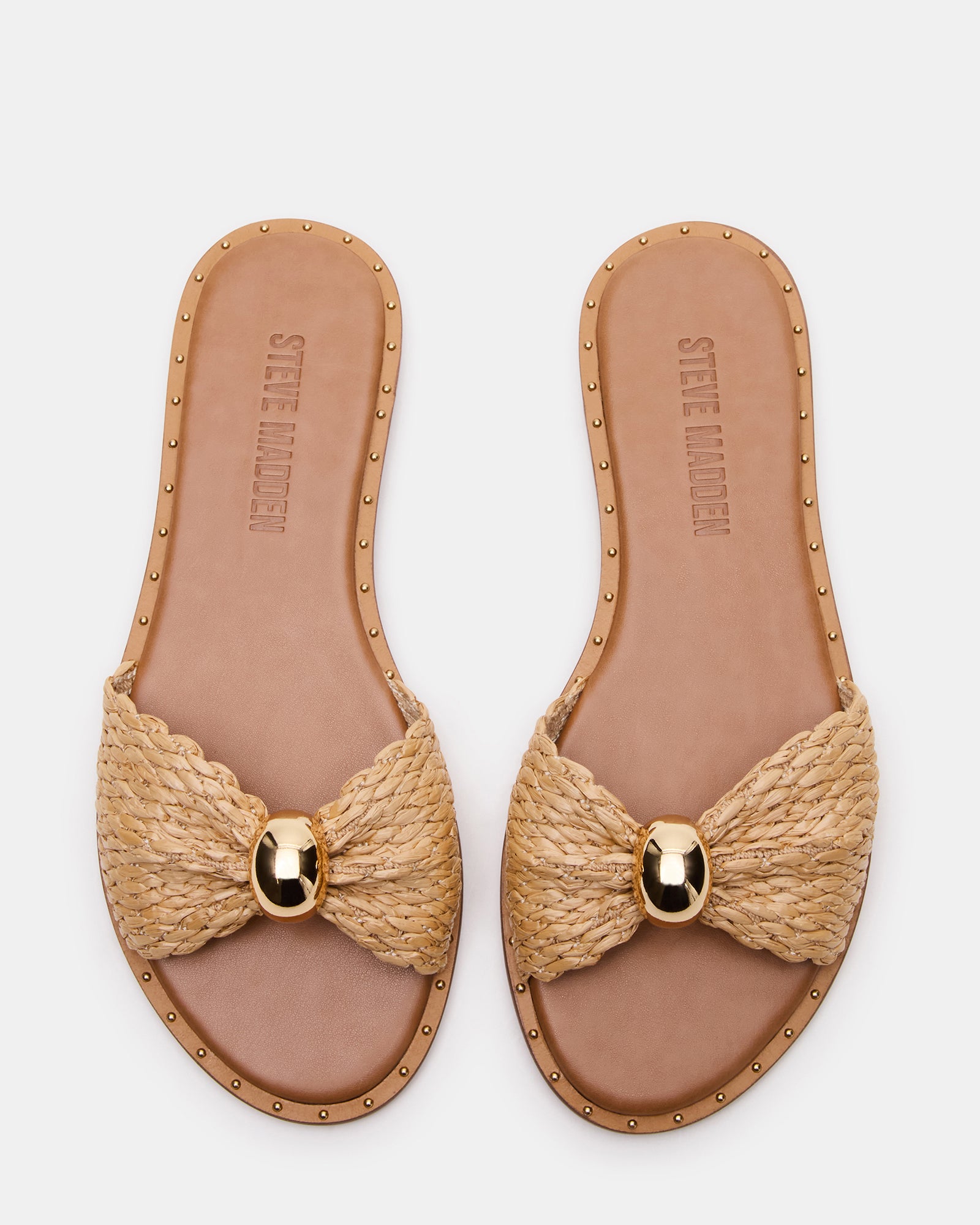 Close-up of the rounded toe and mini studs on DIPSY slide sandals.