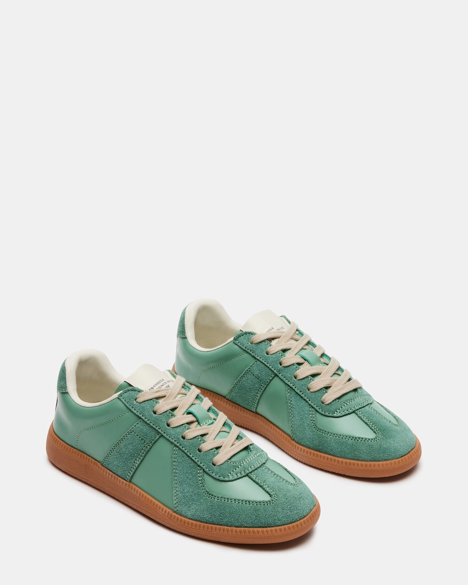 Side view of mens casual shoes styled with jeans for a relaxed look