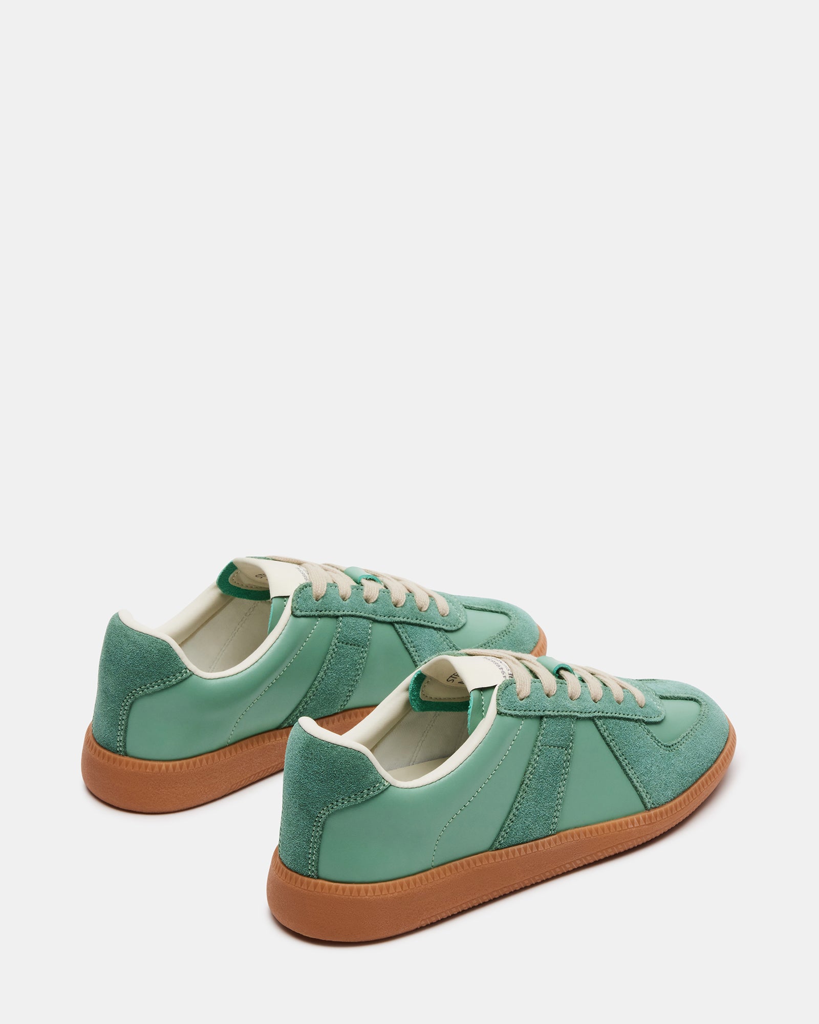Side view of mens casual shoes styled with jeans for a relaxed look