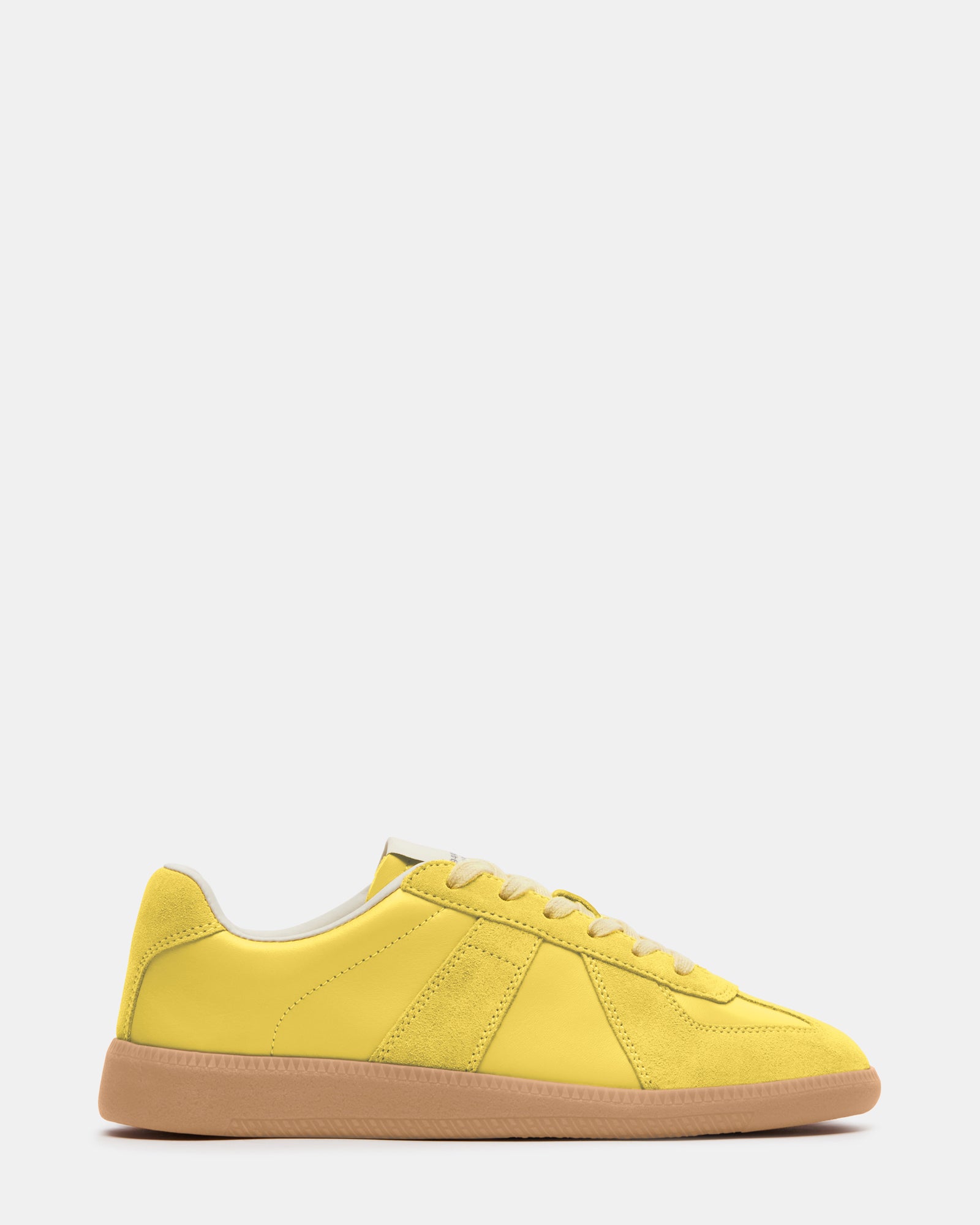 DIXIN yellow low-top sneakers from the side, perfect for casual outings.