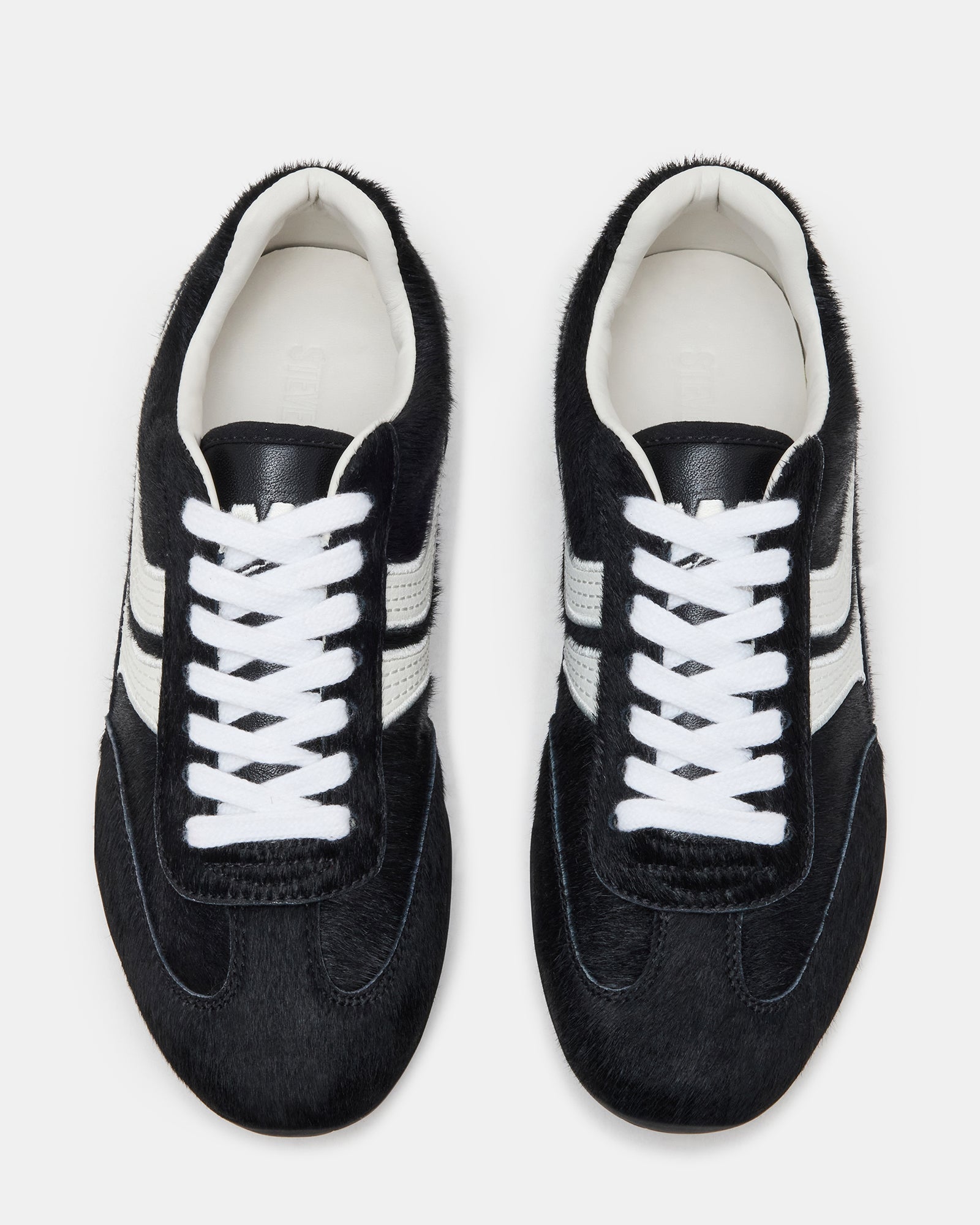 Side profile of DOBSON lace-up low-top sneakers showing textured sole and breathable upper