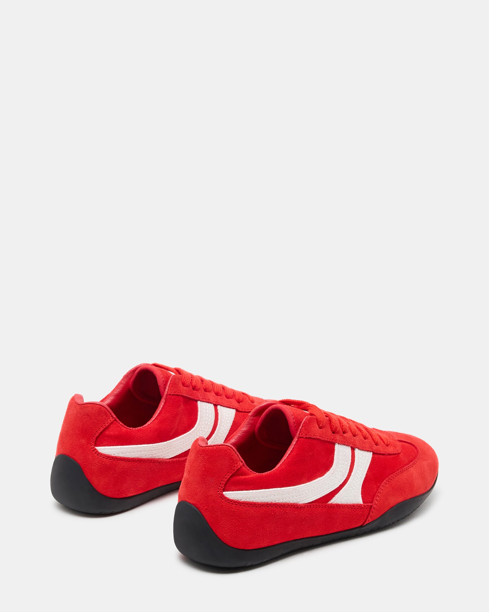 Close-up of textured suede and textile upper with secure lacing system