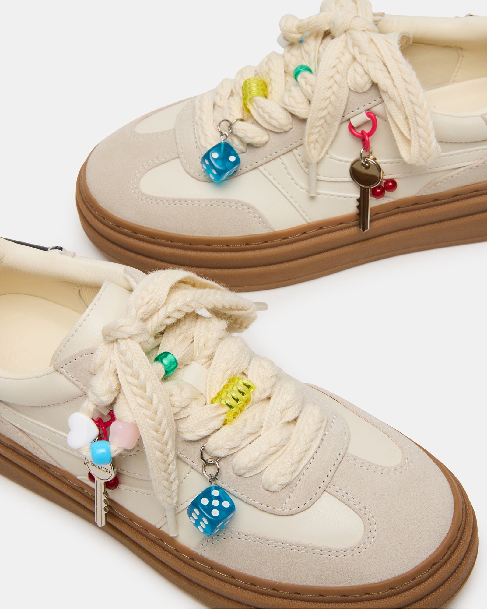 DODGE CHARM low-top sneakers on feet, styled with casual jeans