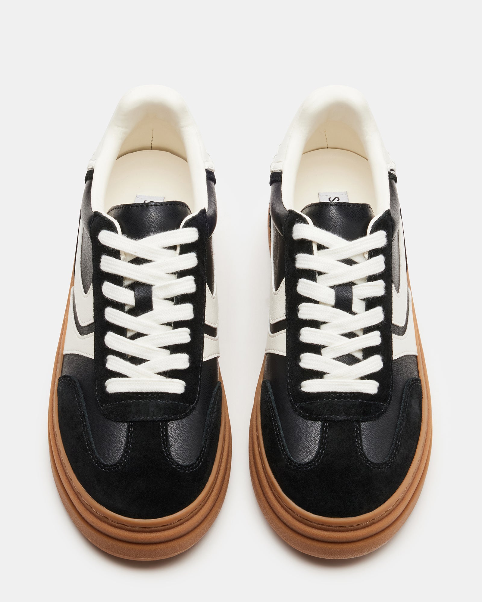 Close-up of the lace-up design on DODGE low-top sneakers.