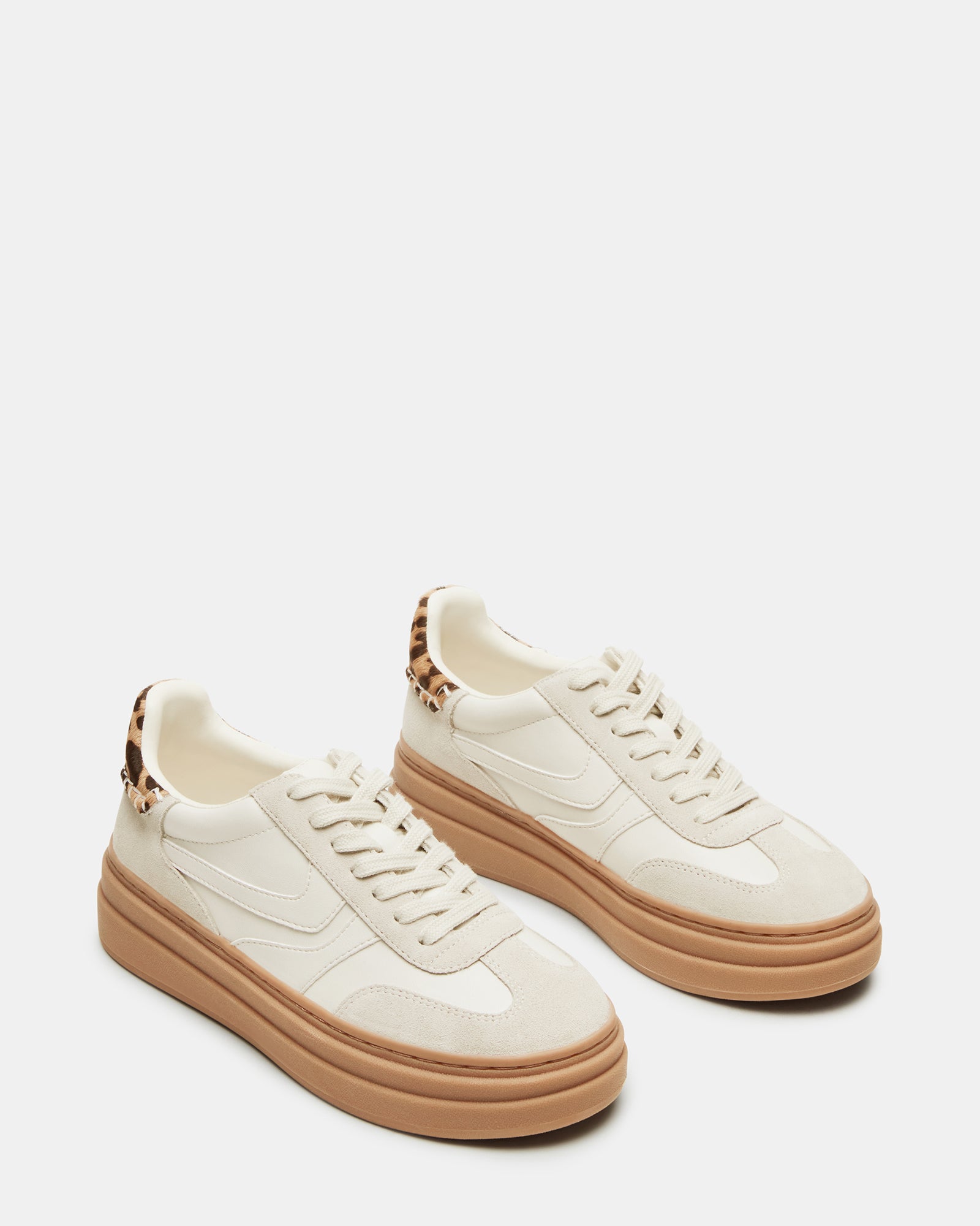 DODGE Bone Multi low-top sneakers worn during a casual outing.