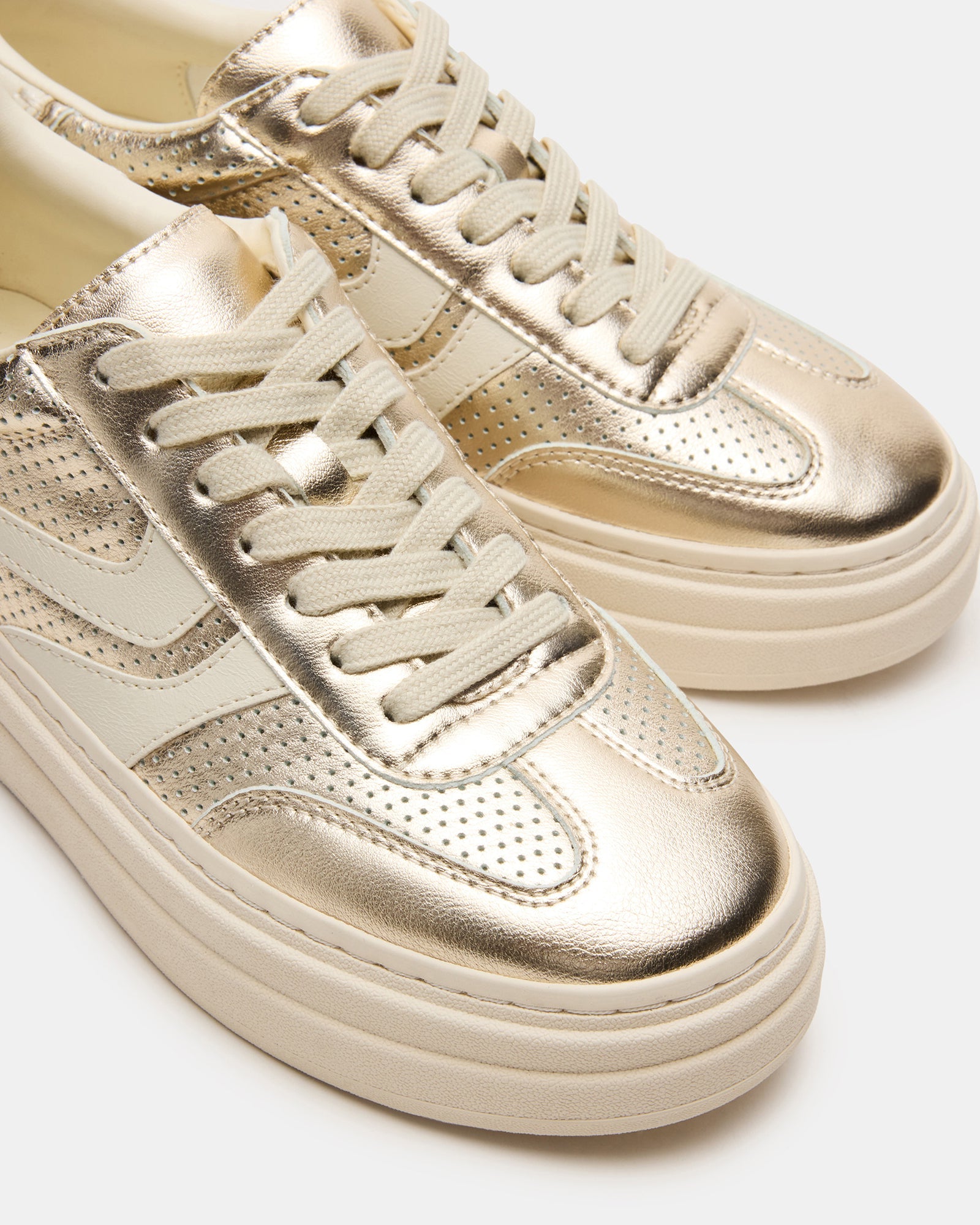Dodge perforated champagne sneakers, side view