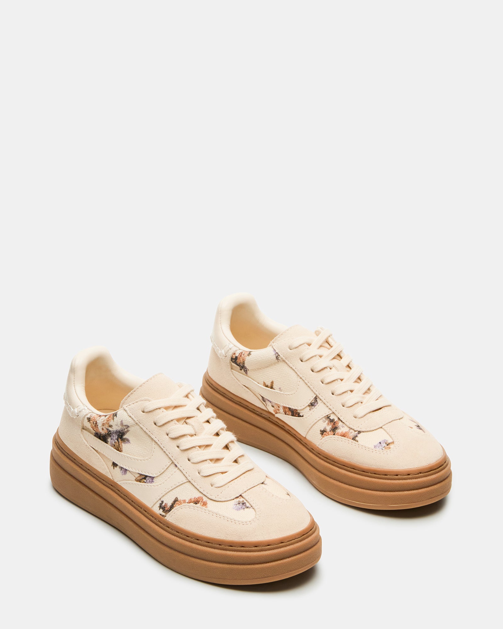 Side view of DODGE Floral Multi low top sneakers with beige laces.